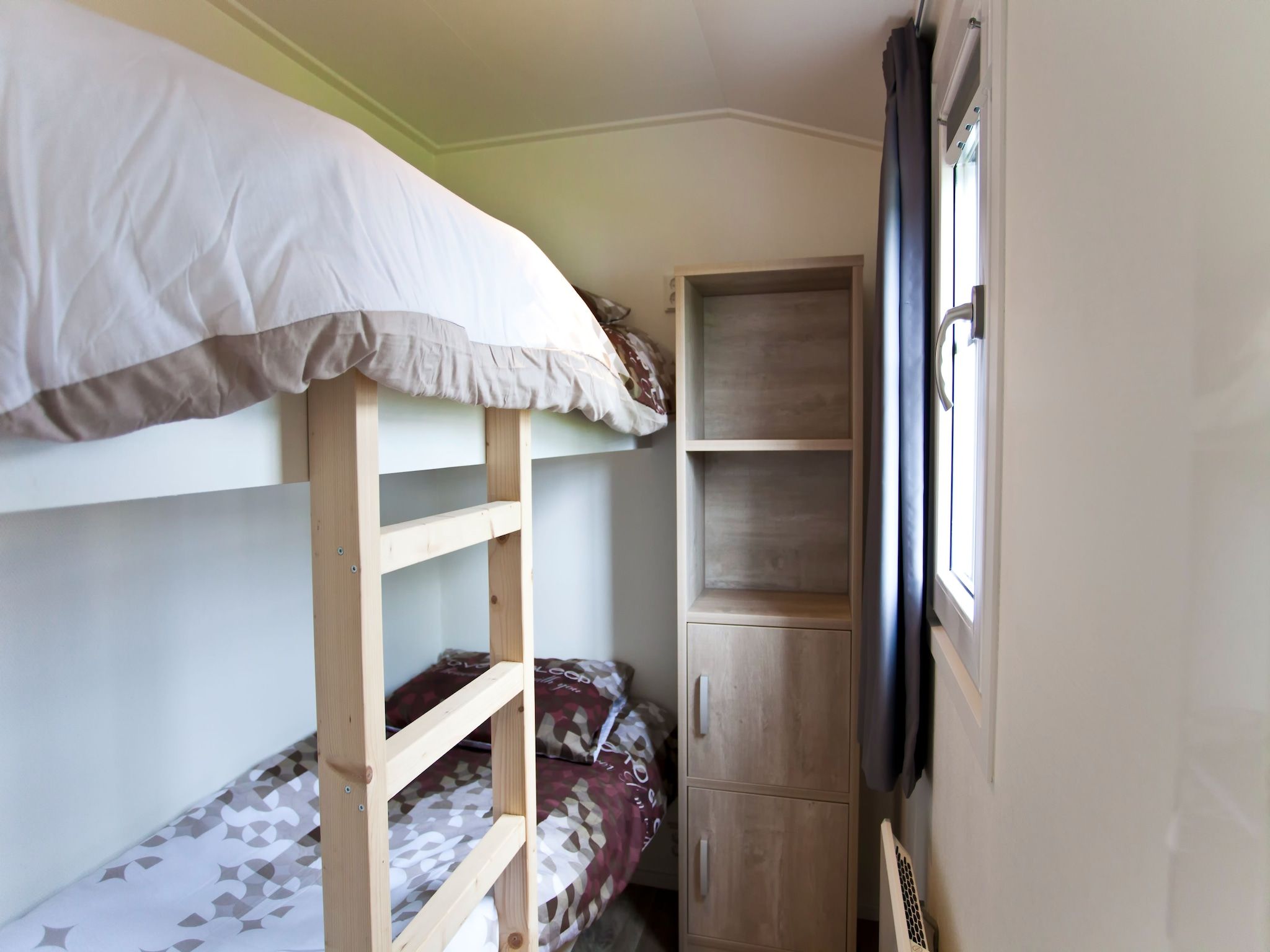 Een slaapkamer van Exclusif Plus 6 in Breskens