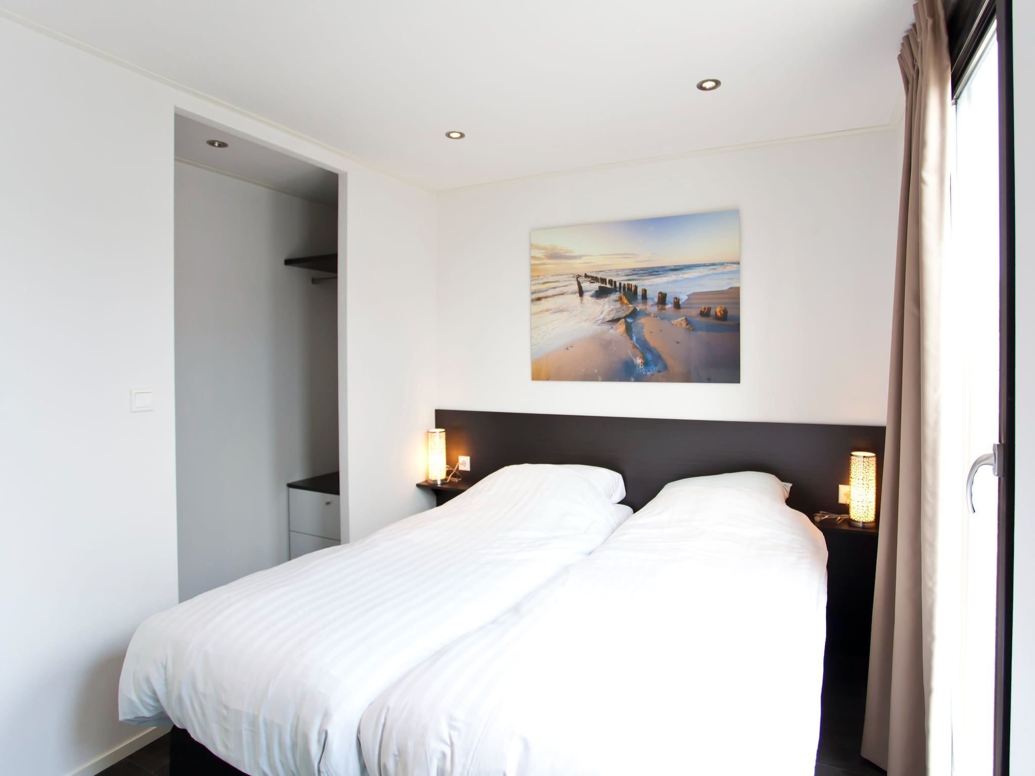 Een slaapkamer van L-Cube 6 in Breskens
