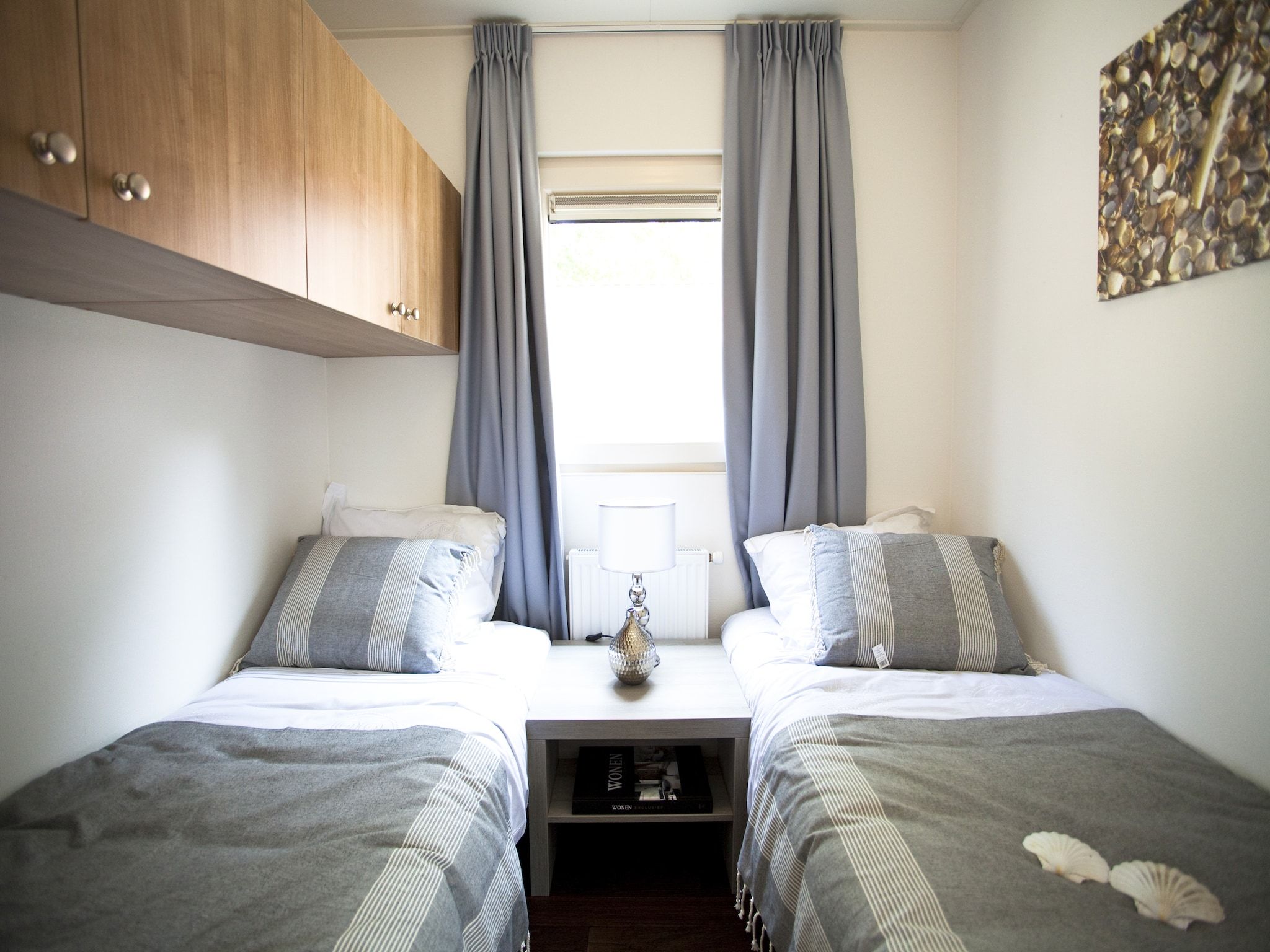 Een slaapkamer van Unique 4 in Breskens
