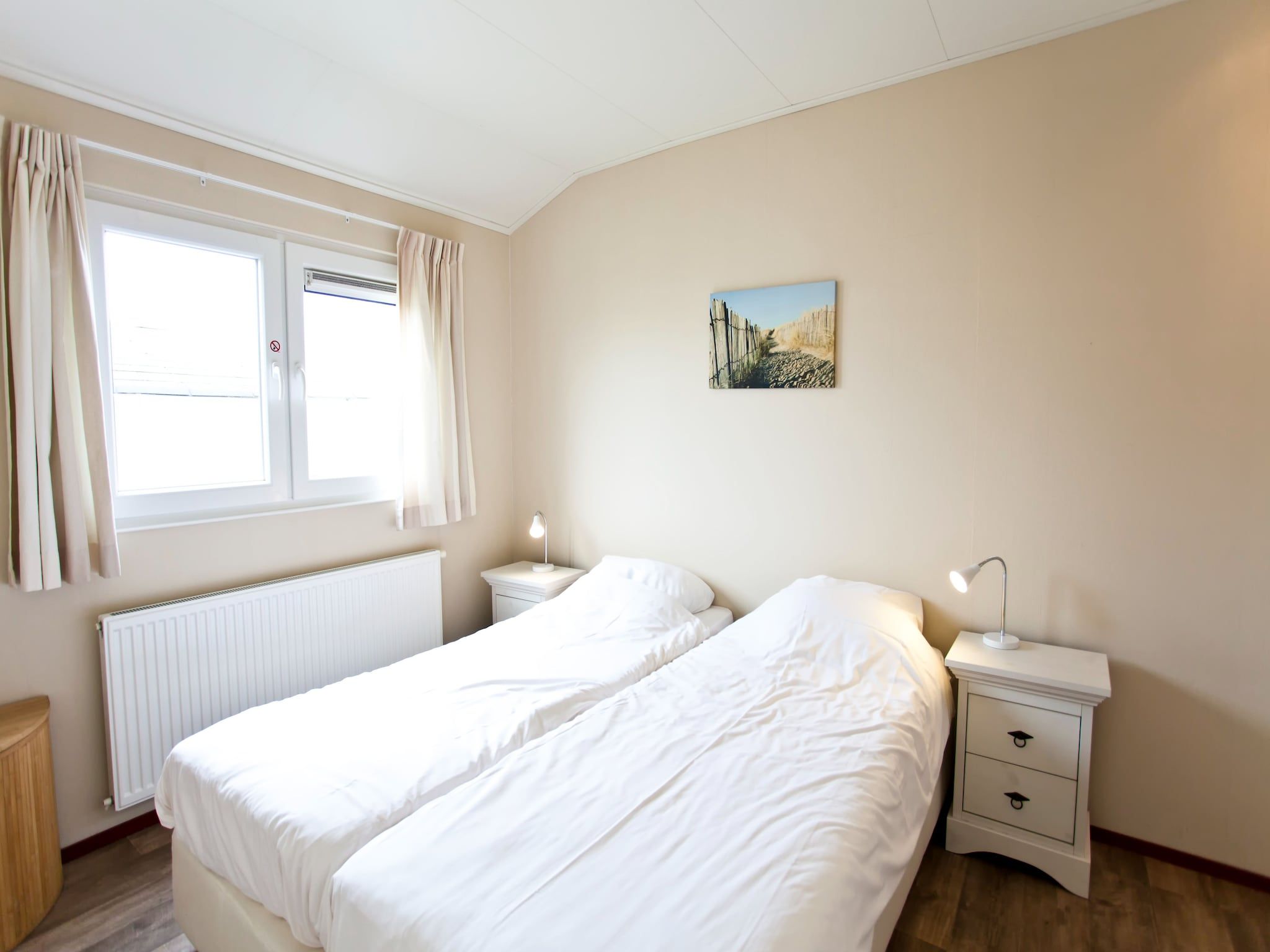 Een slaapkamer van Unique Luxe 4 in Breskens