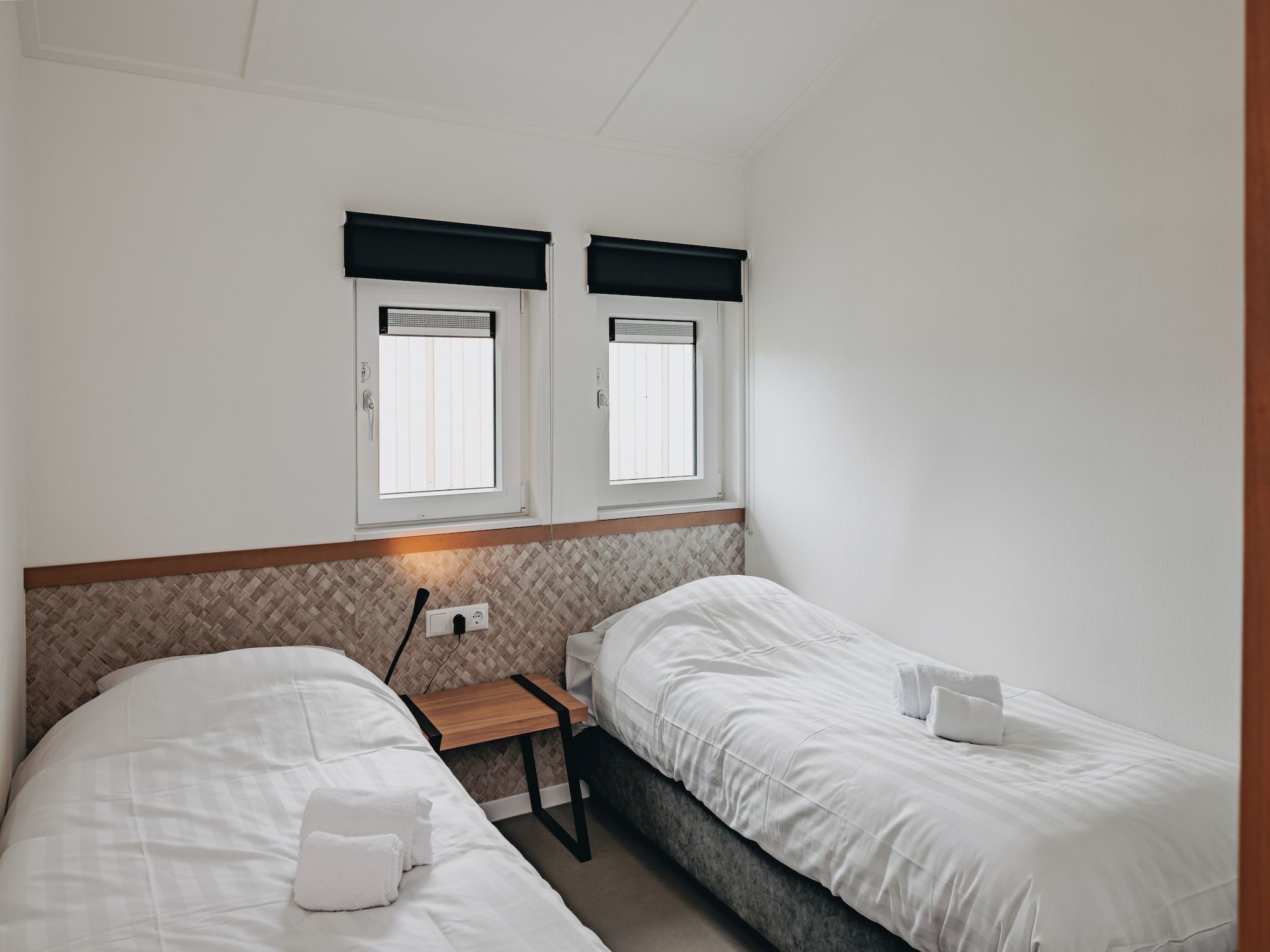 Een slaapkamer van Vakantiepark Zeebad 11 in Breskens