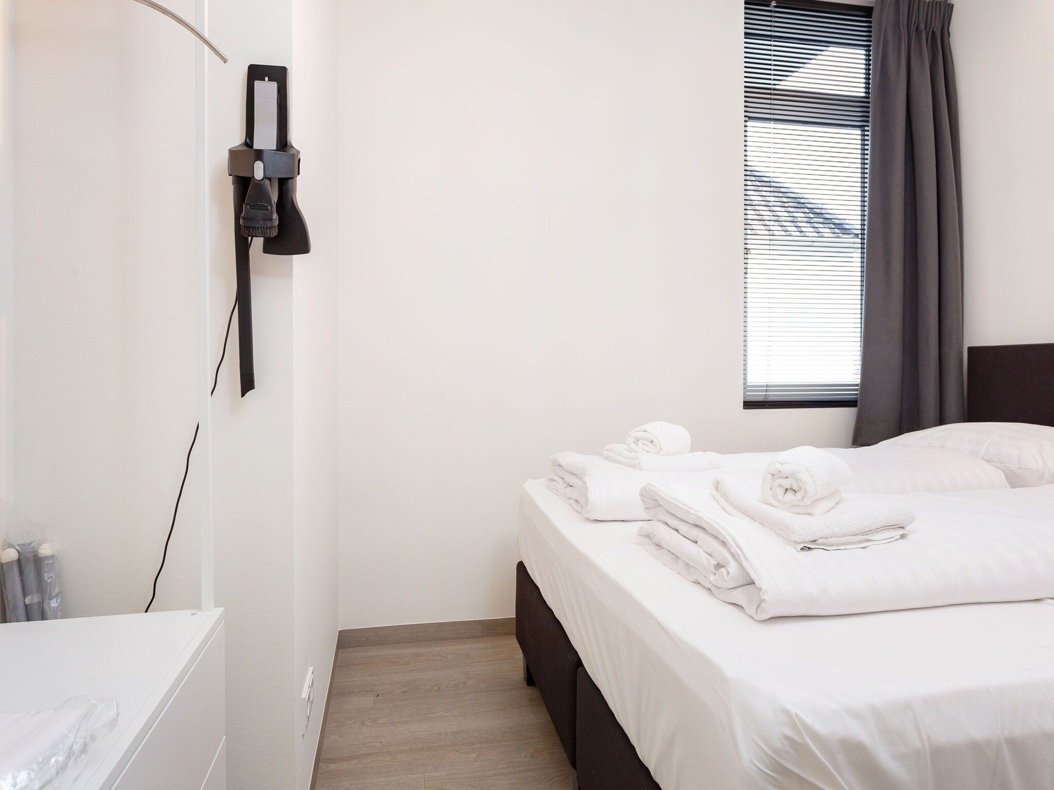 Een slaapkamer van Paviljoenwei 12-24 - begane grond in Offingawier