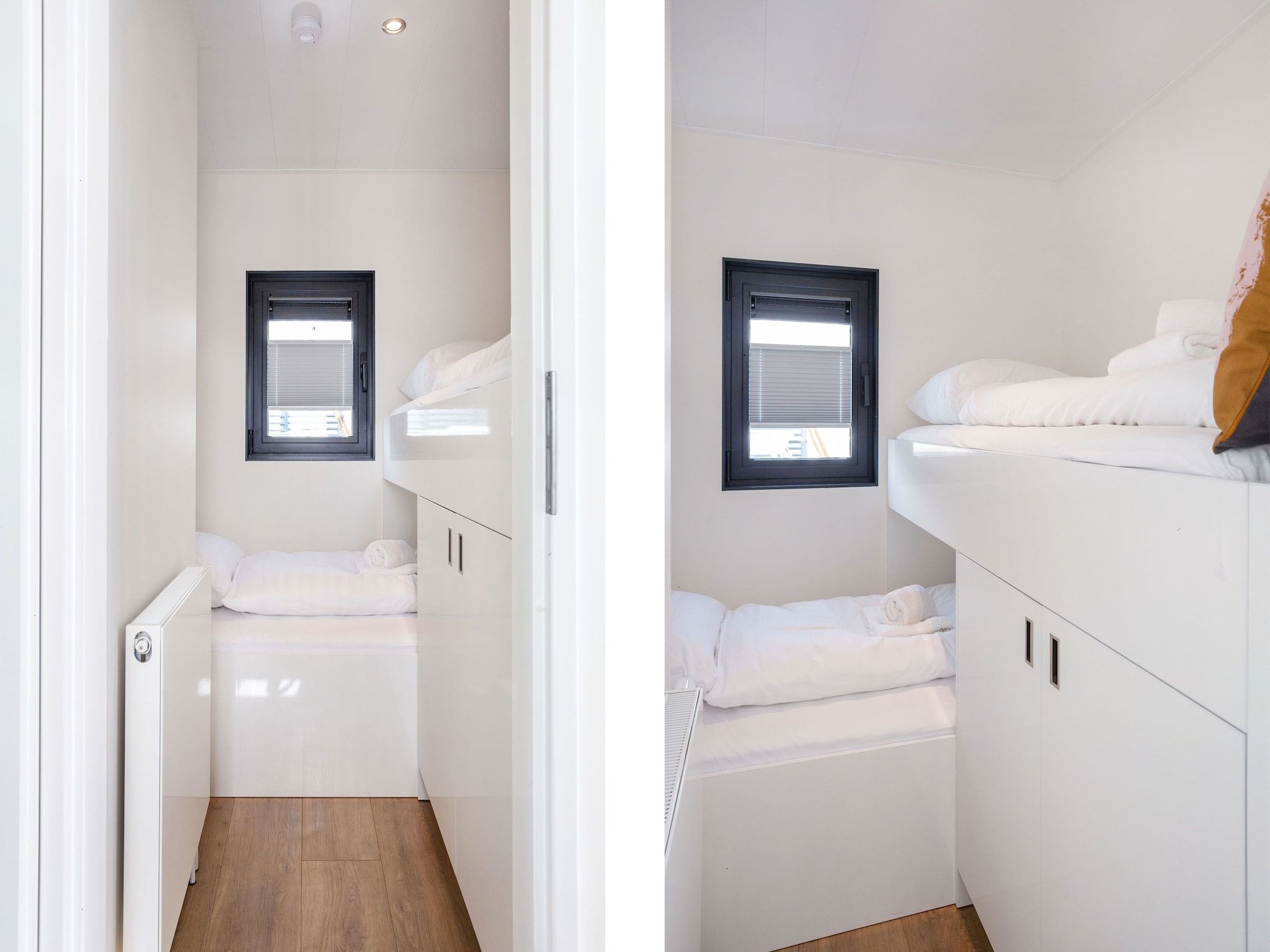 Een slaapkamer van Houseboat Agua Dolce in Offingawier