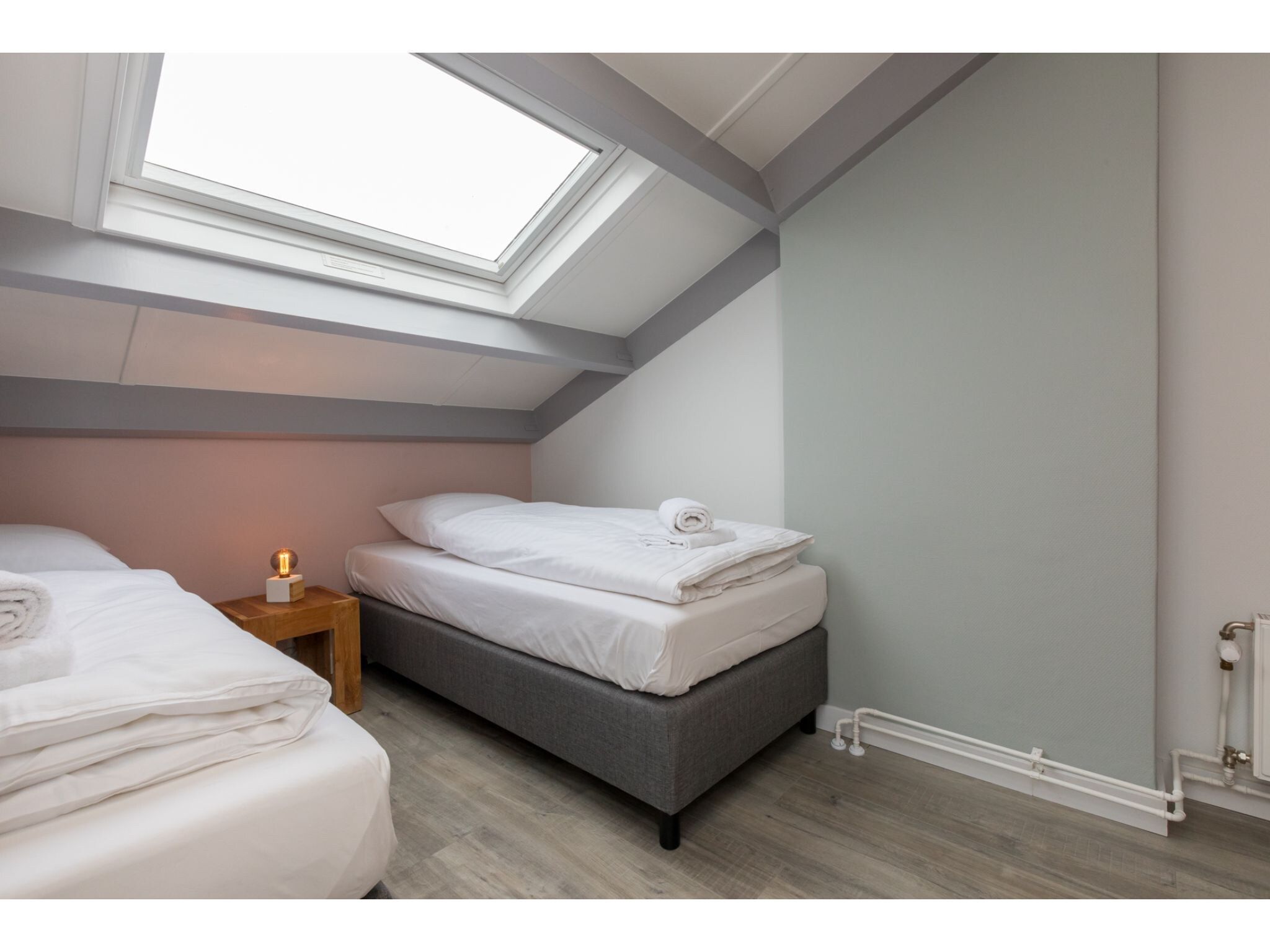 Een slaapkamer van Duinweg 18 in Zoutelande