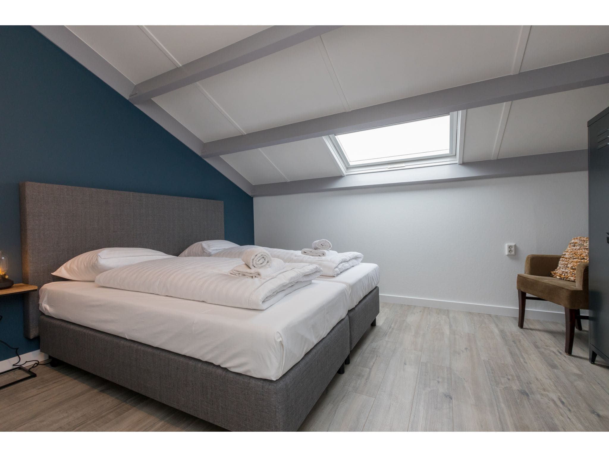 Een slaapkamer van Duinweg 18 in Zoutelande