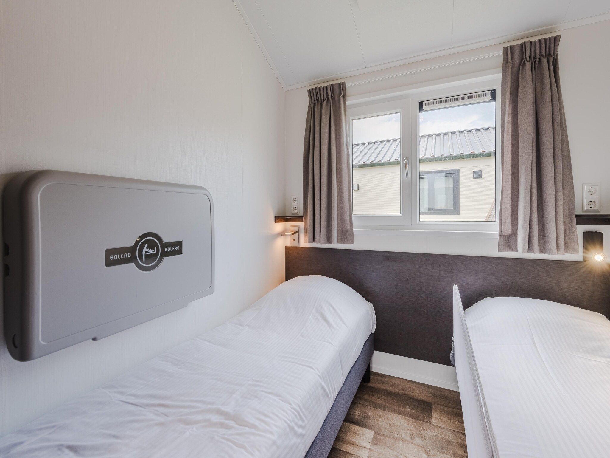 Een slaapkamer van Vakantiepark Giethoorn 8 in Giethoorn