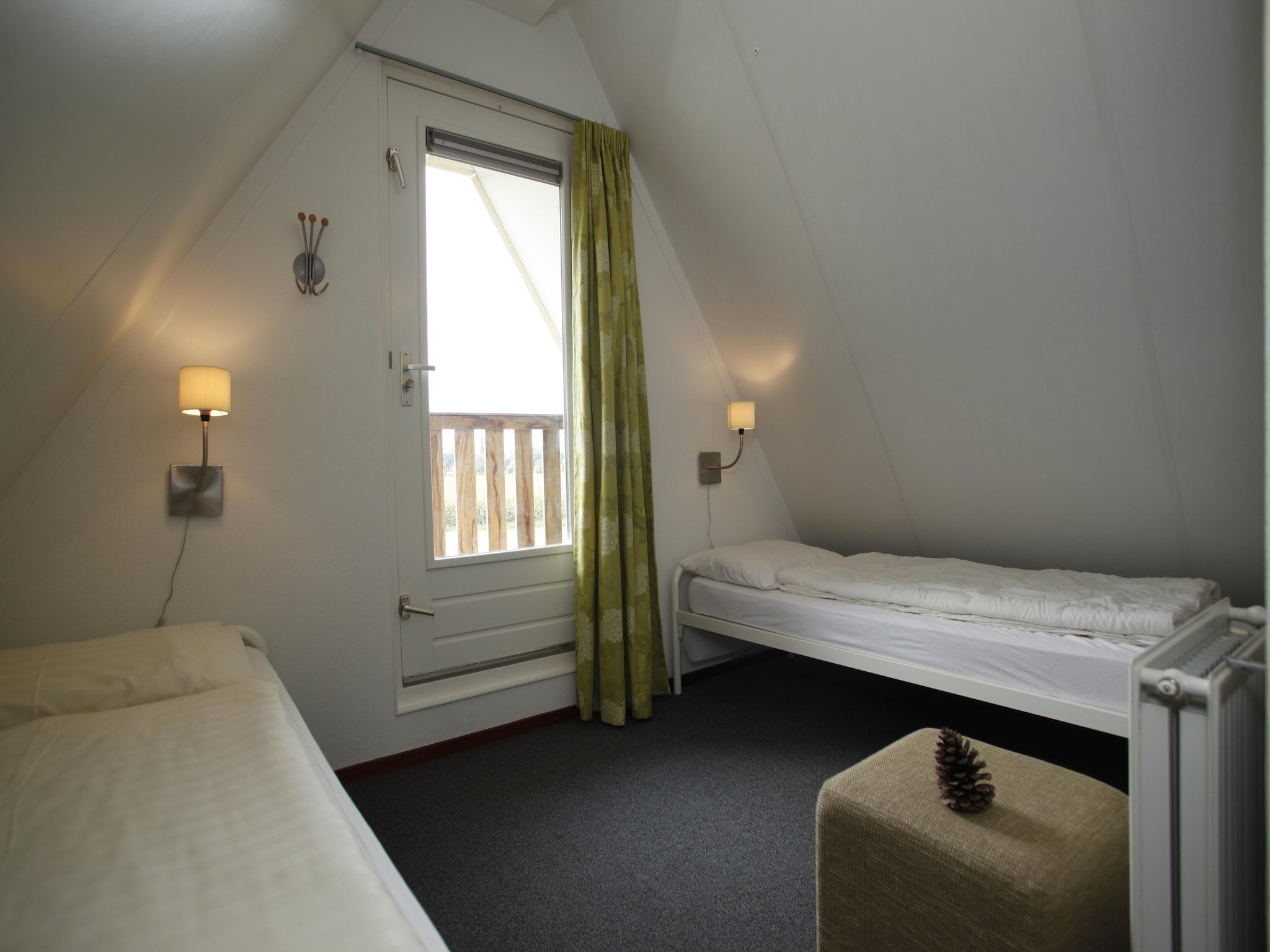 Een slaapkamer van Vakantie bij Meeussen - Molendal 2 in Plasmolen