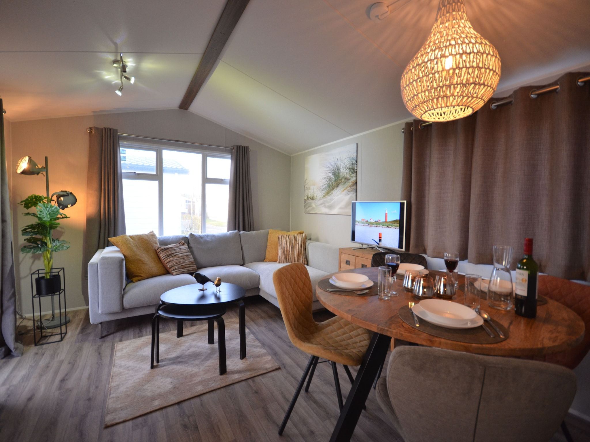 De woonkamer van Recreatiepark Wiringherlant - Wiringher Chalet 83 in Hippolytushoef