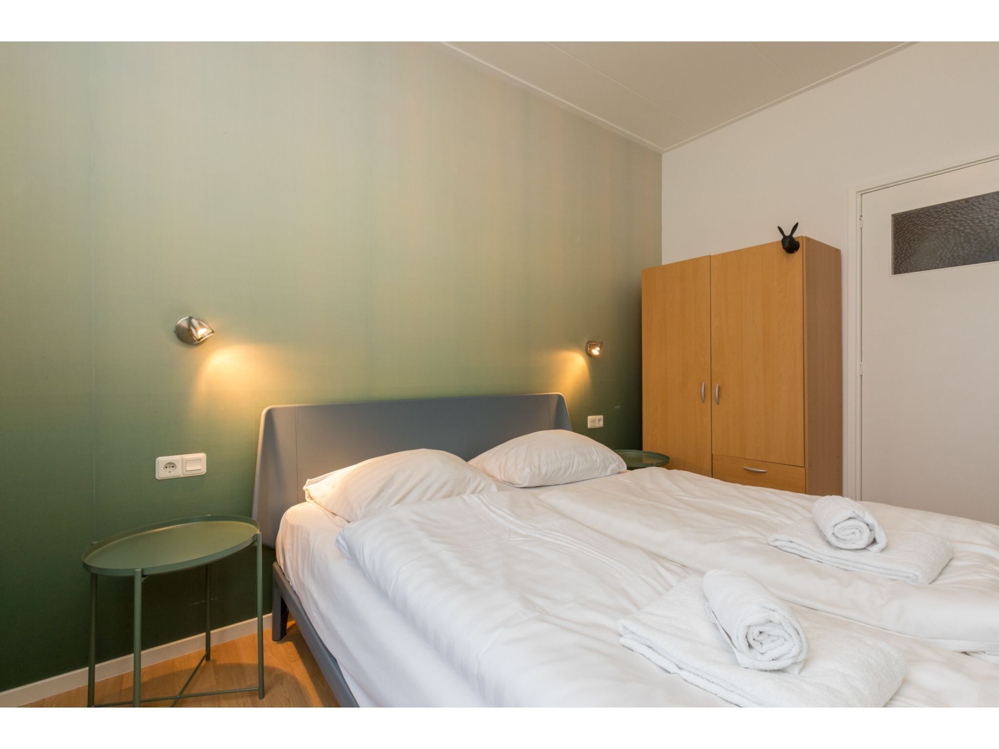 Een slaapkamer van Appartement - Kon Emmaweg 6  beneden app in Vrouwenpolder