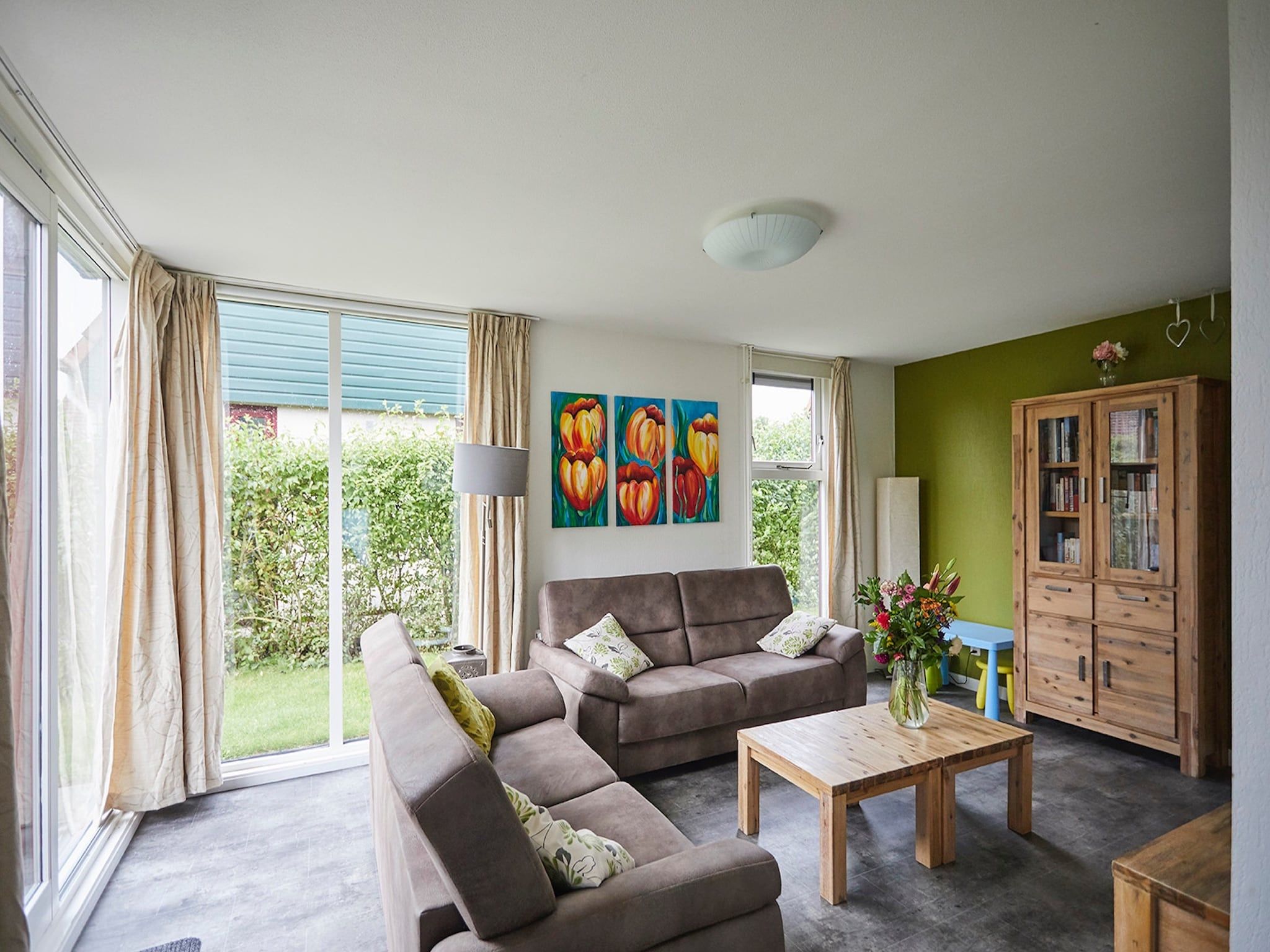 De woonkamer van Vakantiepark Hof van Zeeland 3 in Heinkenszand