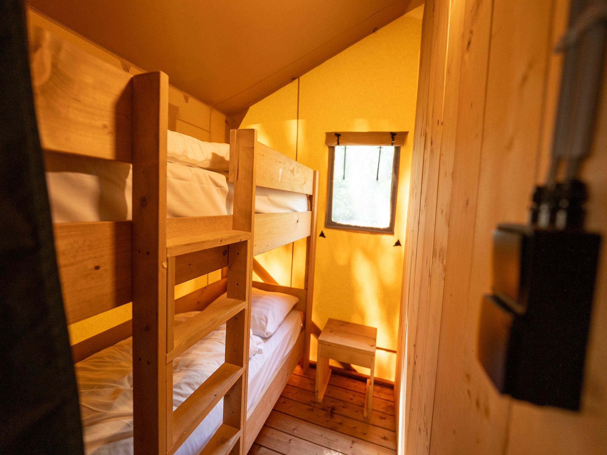 Een slaapkamer van Vakantiepark Hunzedal 16 in Borger