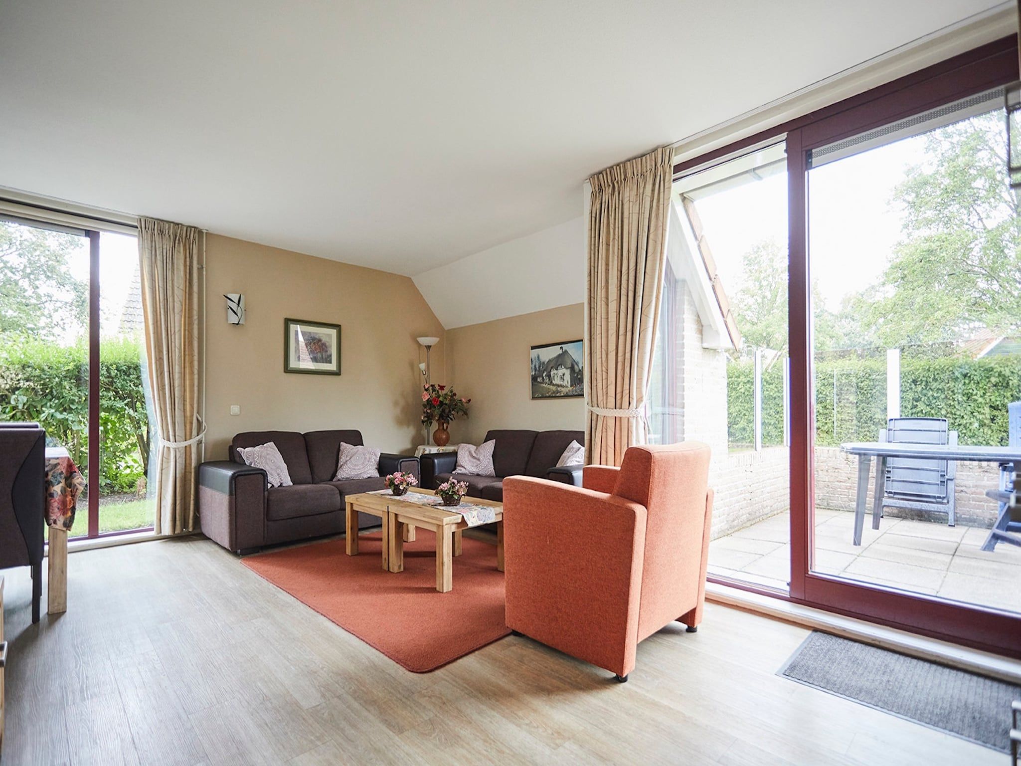 De woonkamer van Vakantiepark Hof van Zeeland 5 in Heinkenszand
