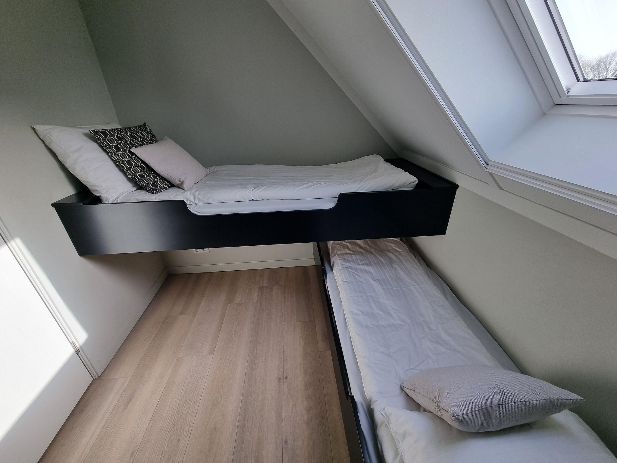 Een slaapkamer van Watervilla Fjirtjin in Balk