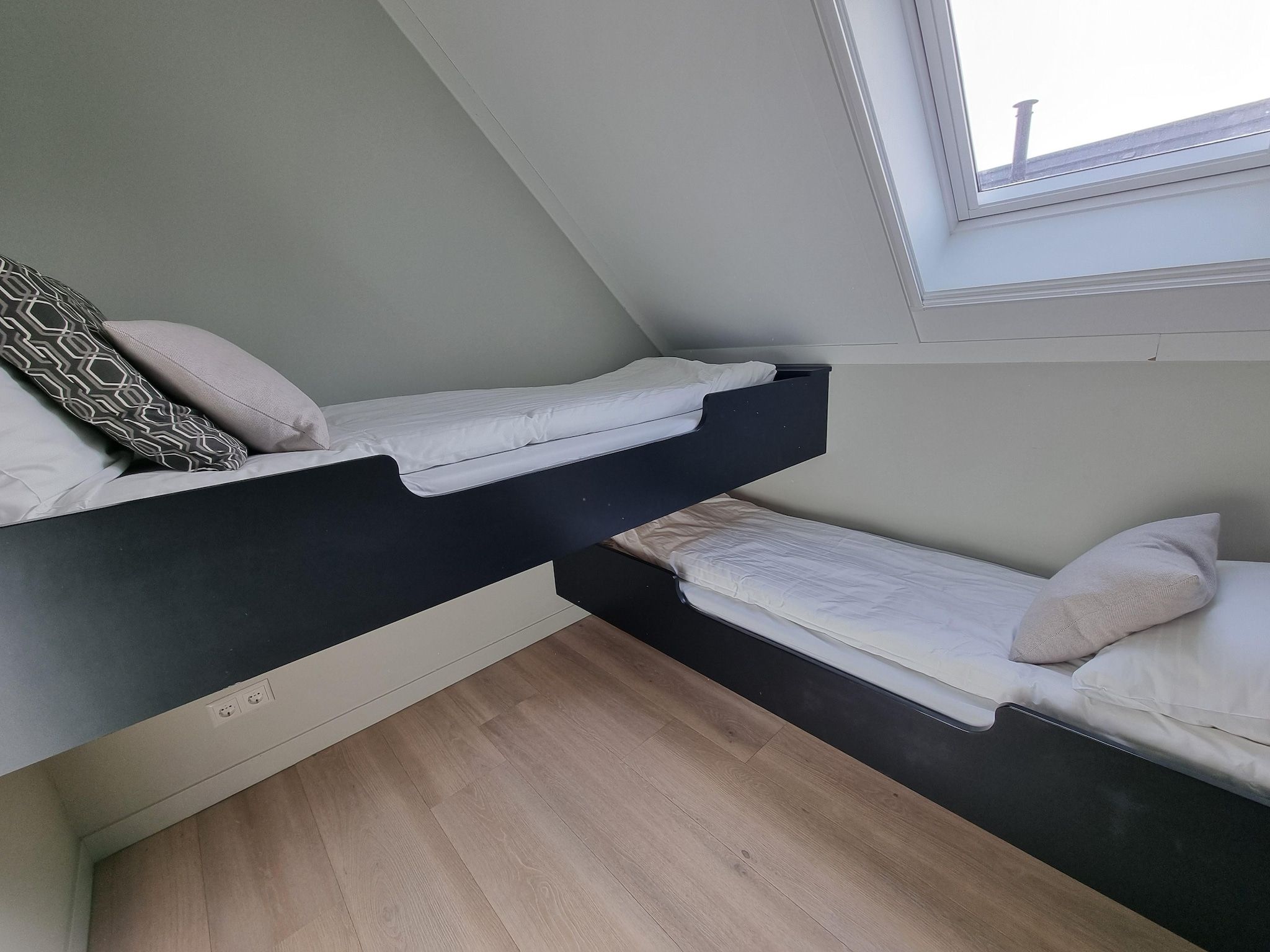 Een slaapkamer van Watervilla Achttjin in Balk