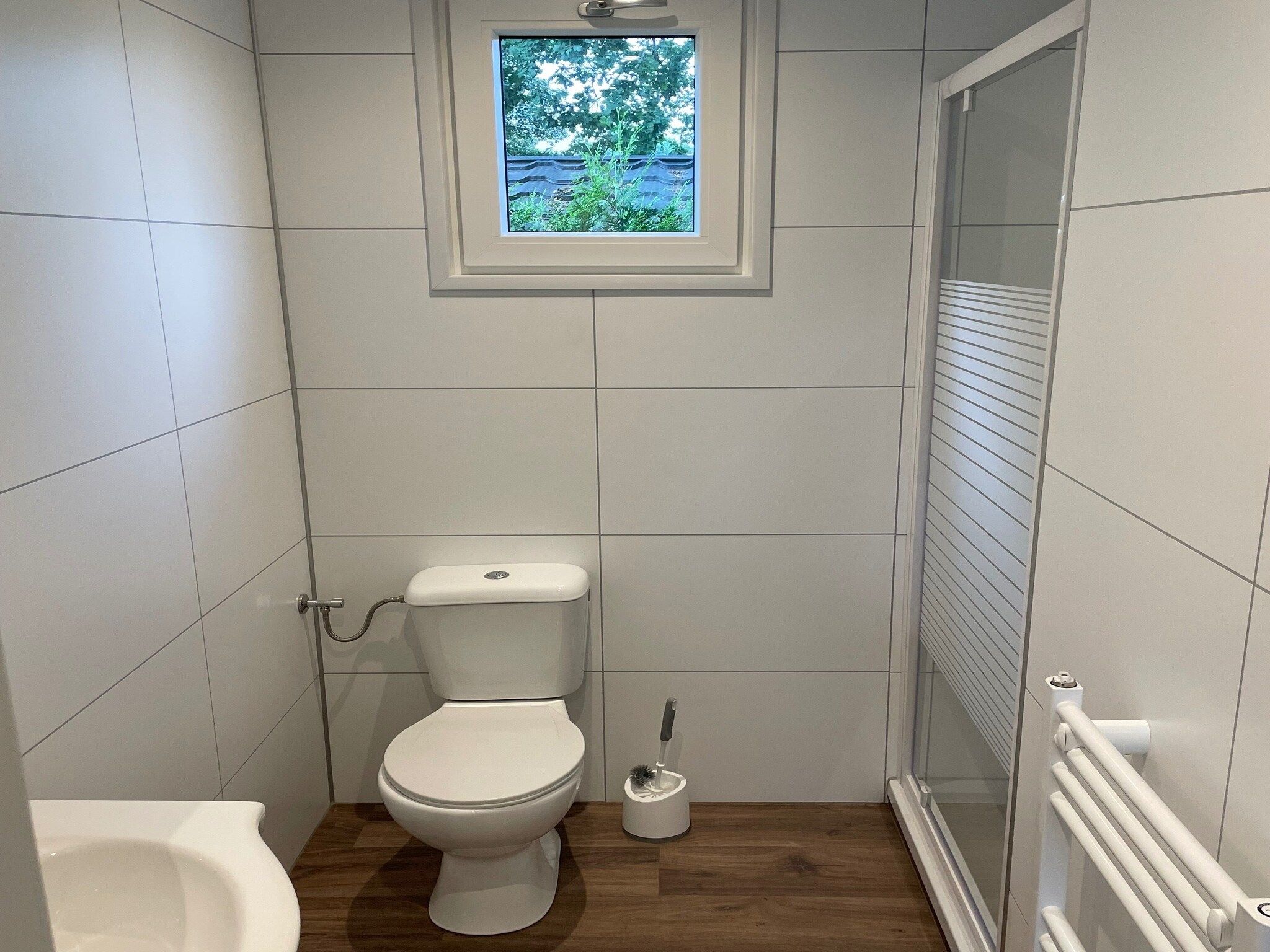 De badkamer van Recreatiepark Rhederlaagse Meren 1 in Lathum
