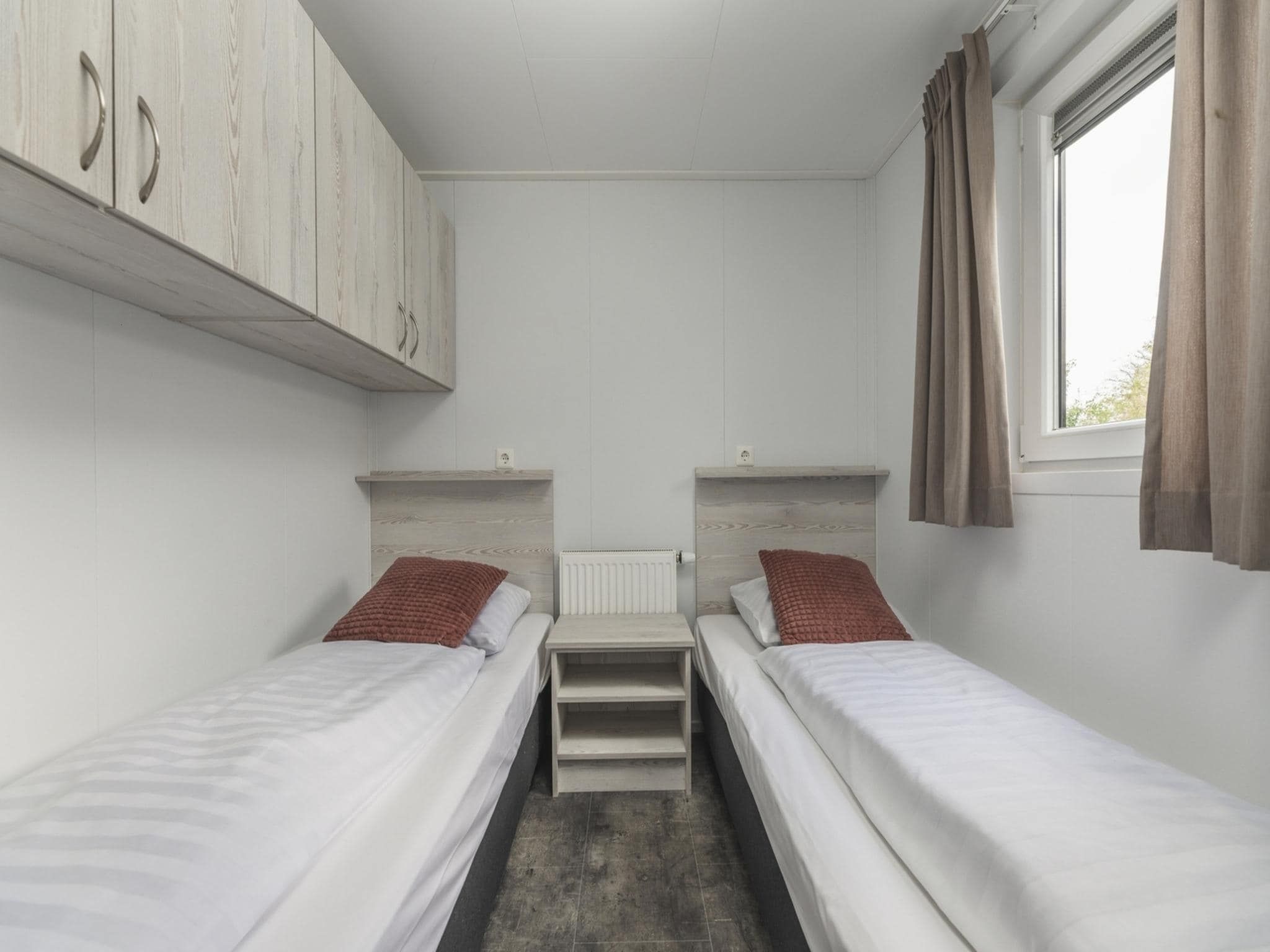 Een slaapkamer van Vakantiepark Mölke 30 in Zuna