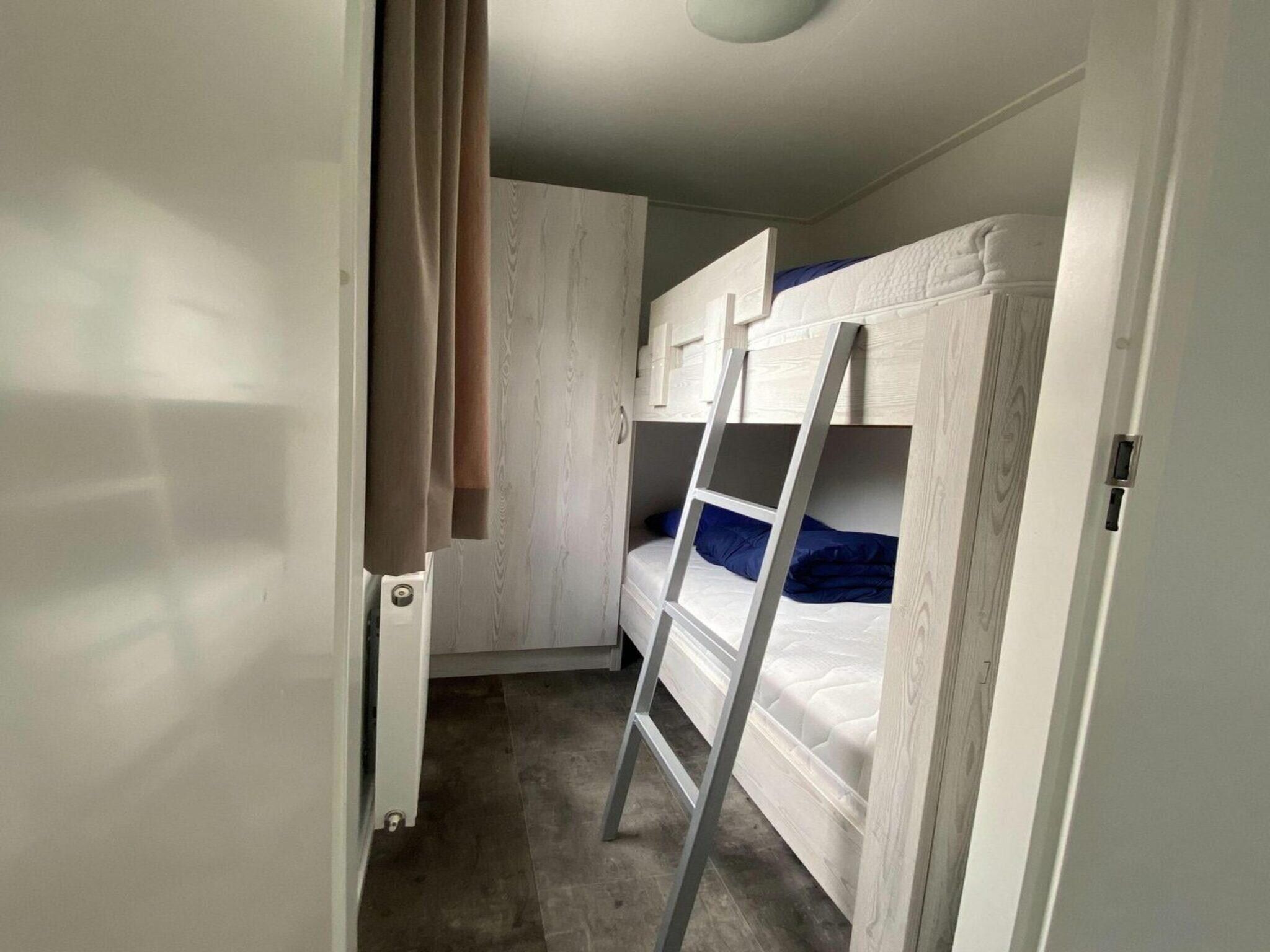 Een slaapkamer van Vakantiepark Mölke 30 in Zuna