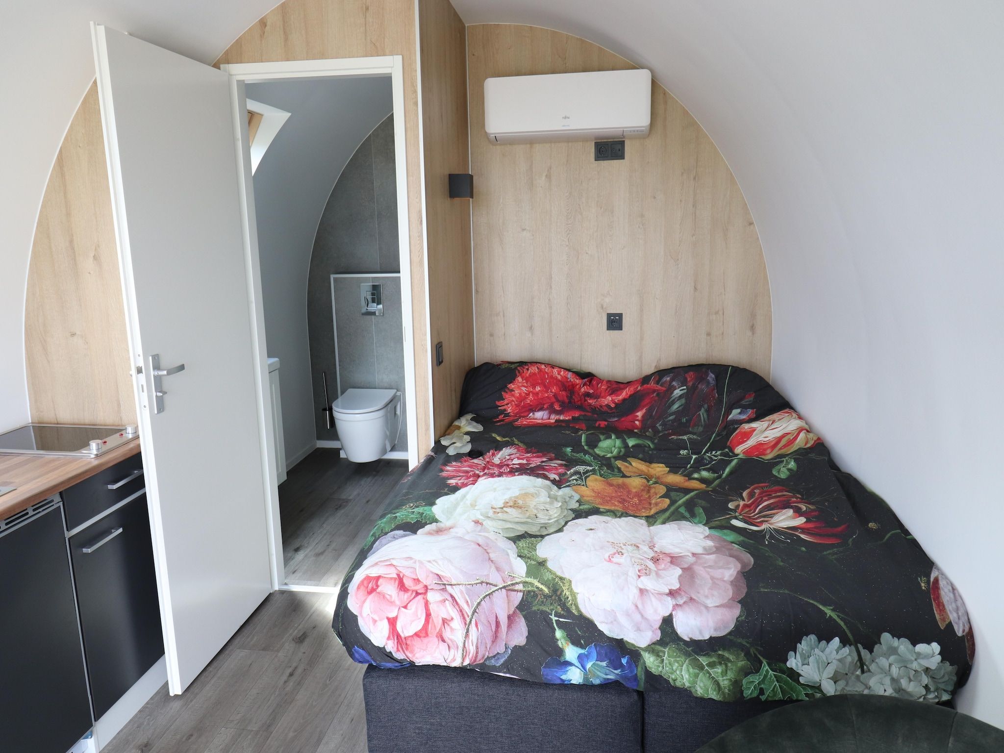 Een slaapkamer van Natuurlodge Graspieper 2p in Drenthe