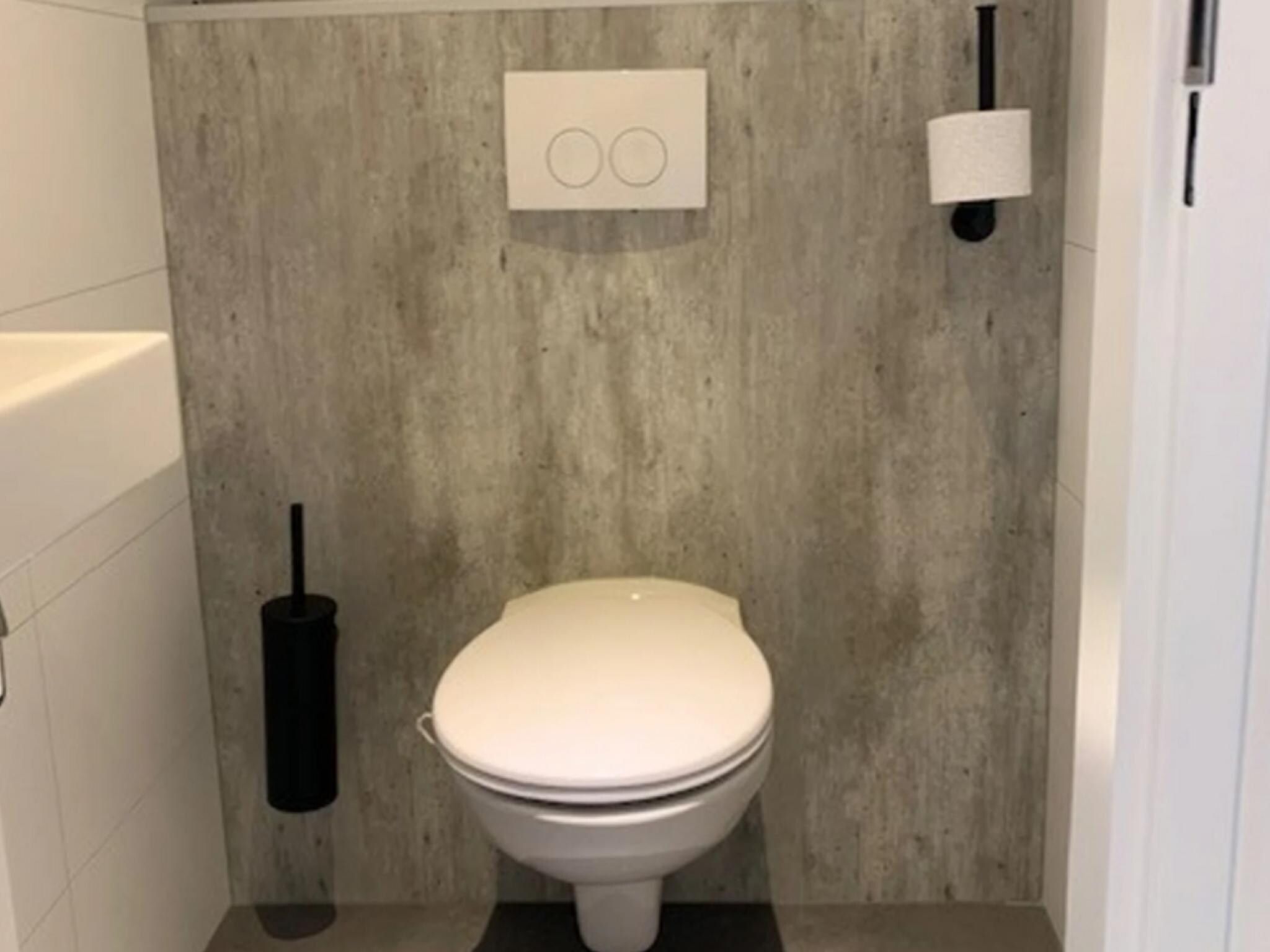 De badkamer van Wellnesslodge Kievit 2p in Dalerveen