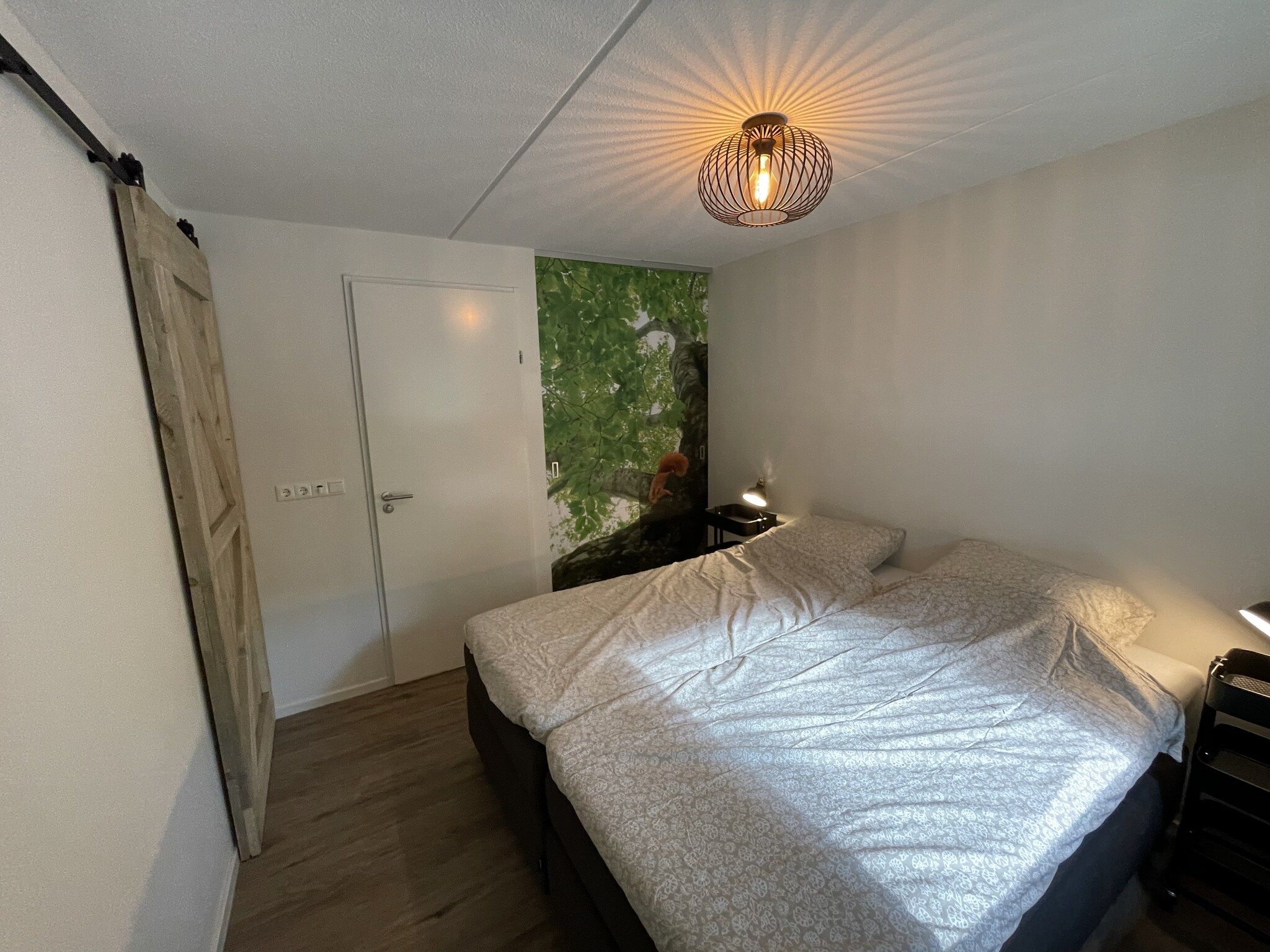 Een slaapkamer van Energievriendelijk 't Brummelhuus H556 in Lochem