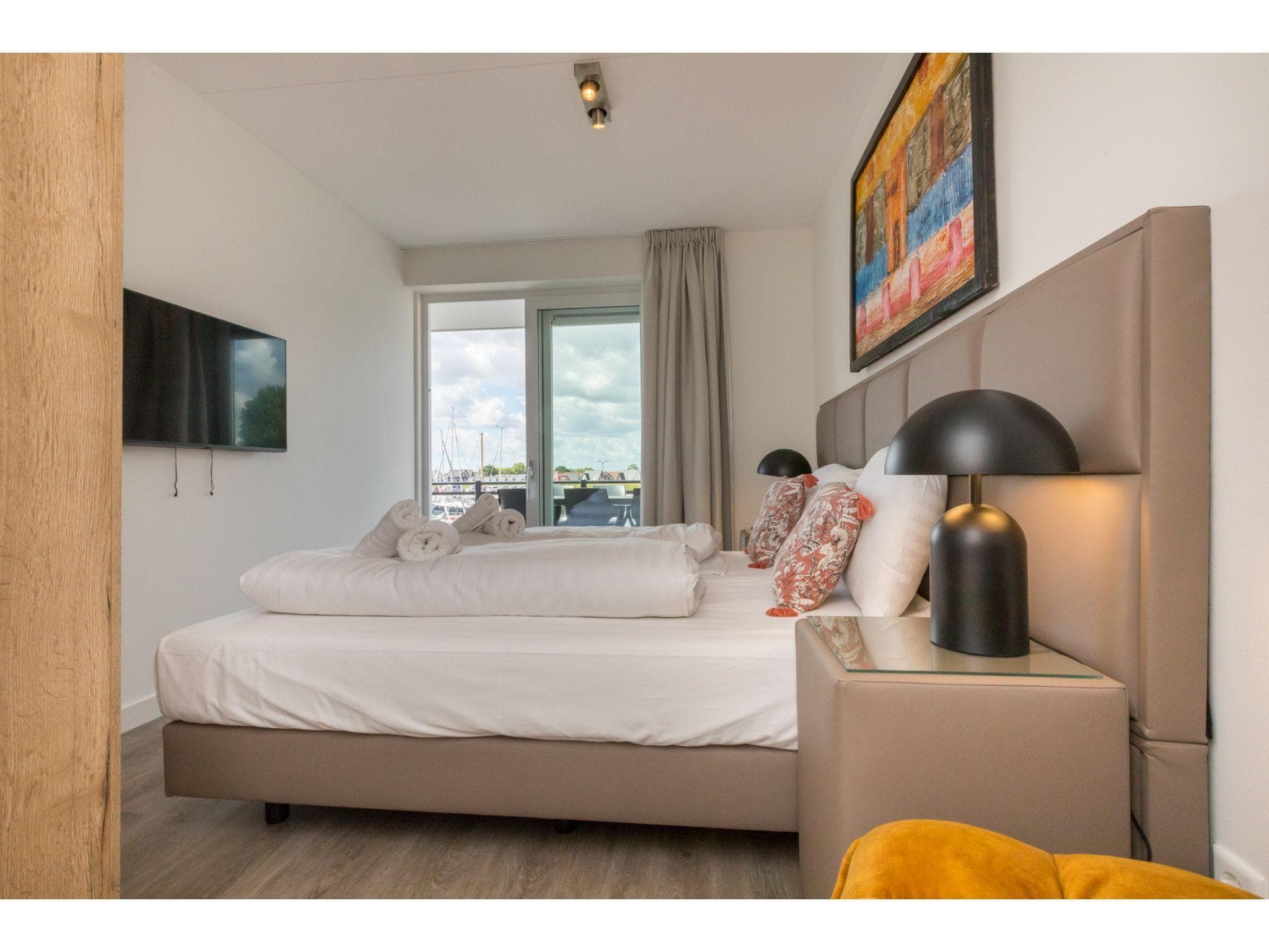 Een slaapkamer van Havenweg 8-18 in St. Annaland