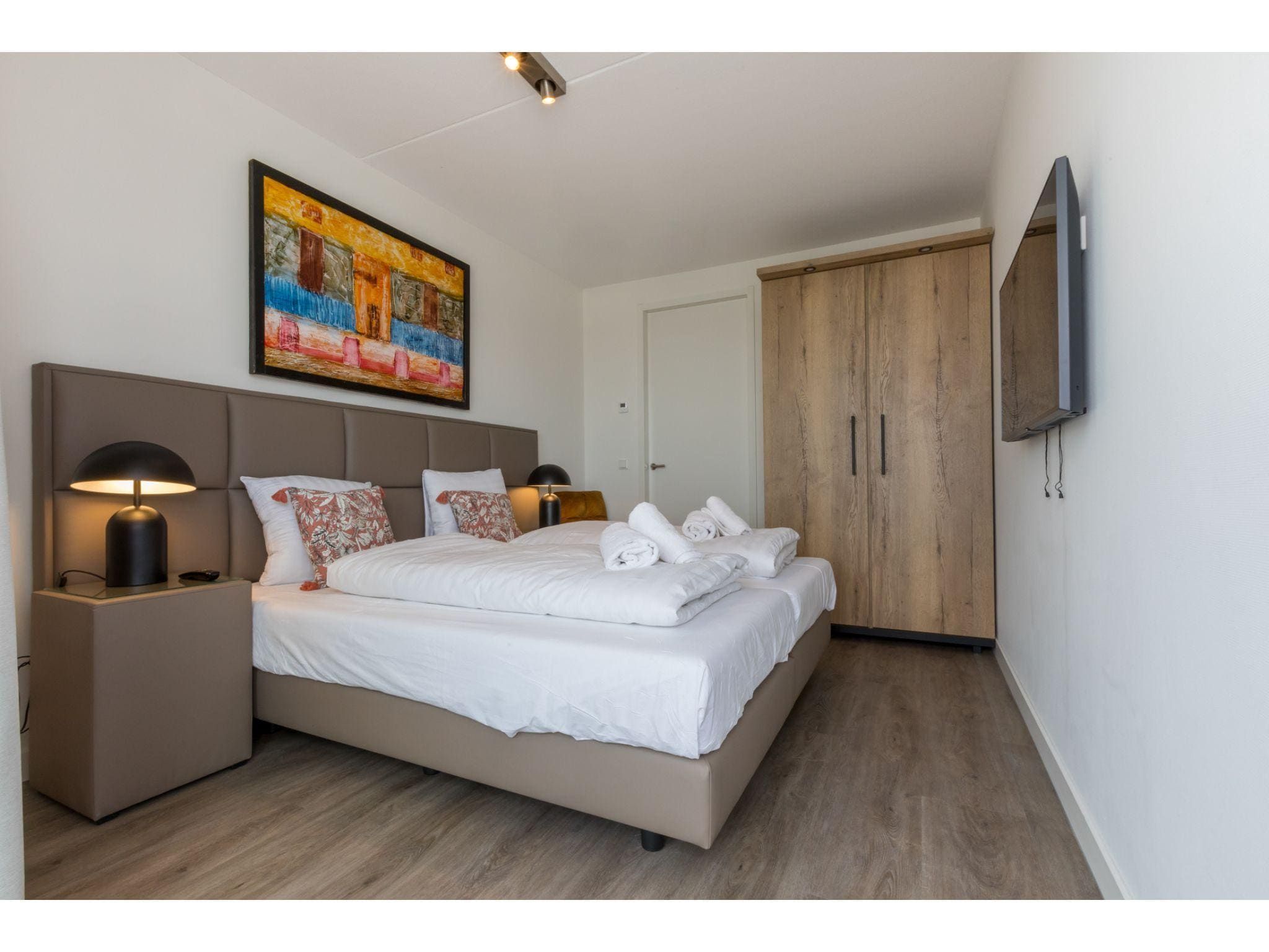 Een slaapkamer van Havenweg 8-18 in St. Annaland
