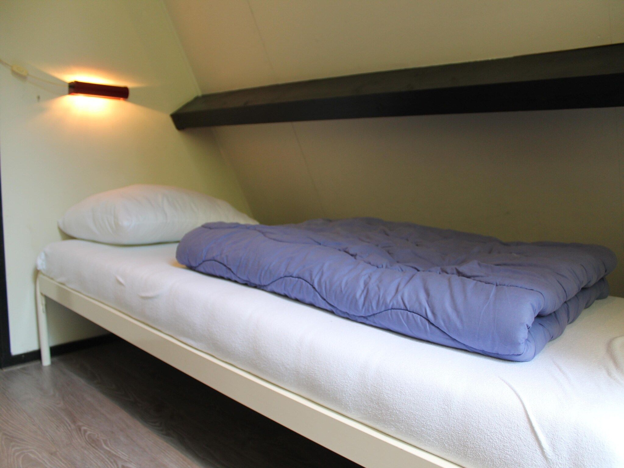 Een slaapkamer van Vosseven 73 Maretak in Stramproy