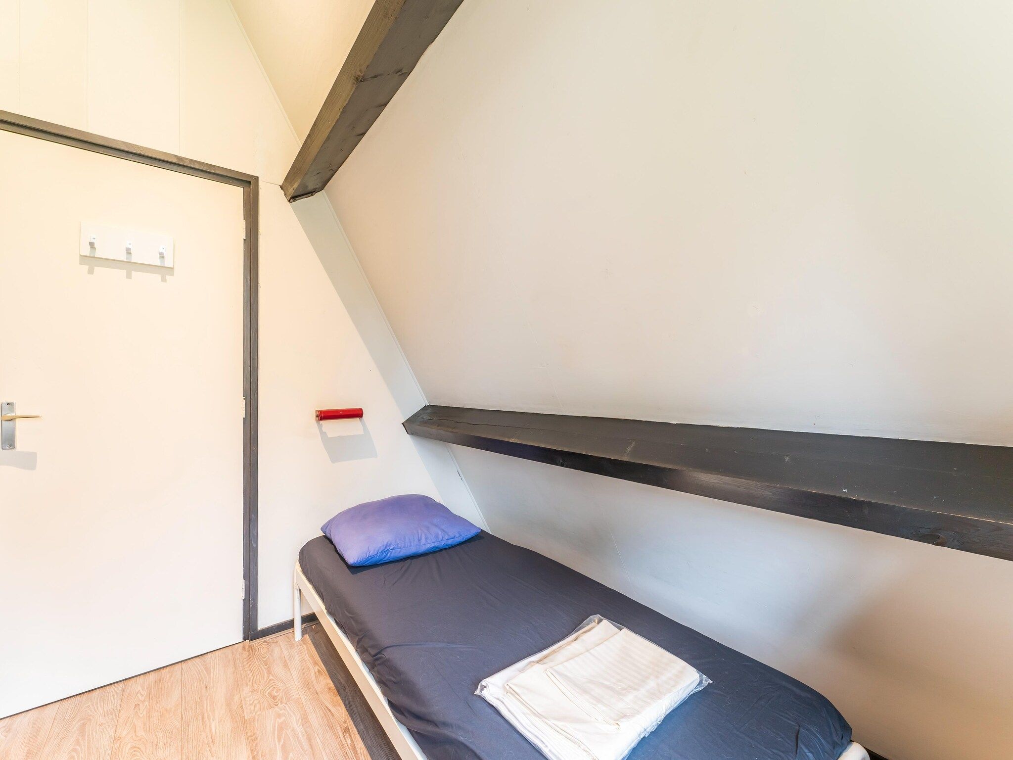 Een slaapkamer van Vosseven 73 Maretak in Stramproy