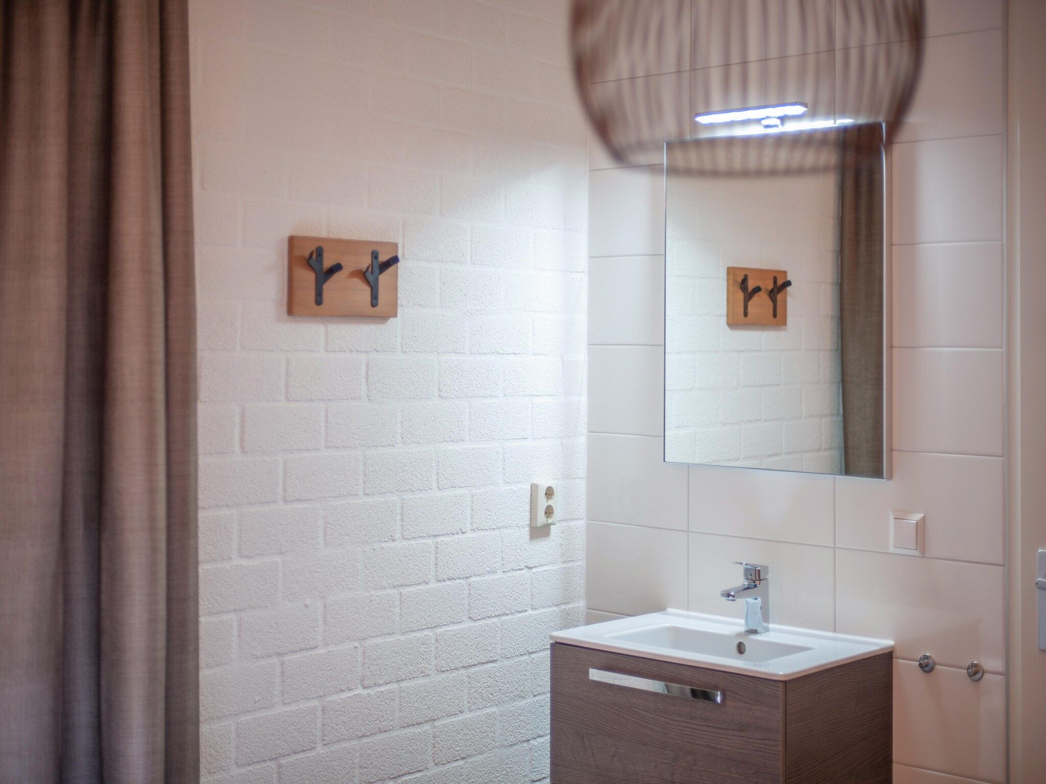 De badkamer van Vakantiepark de Katjeskelder 23 in Oosterhout