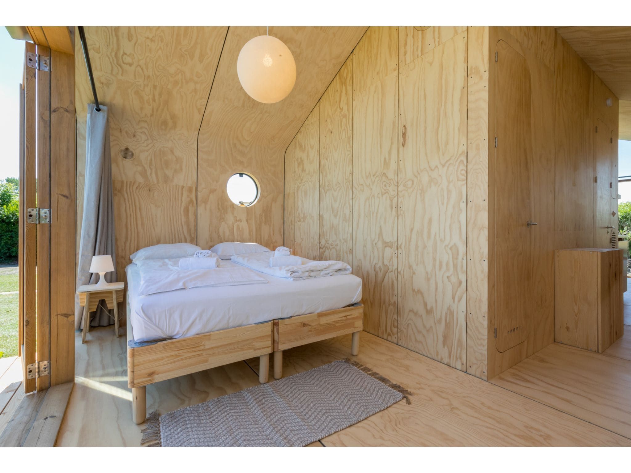 Een slaapkamer van Wikkelhouse - Kon Emmaweg 6  Vrouwenpolder in Vrouwenpolder