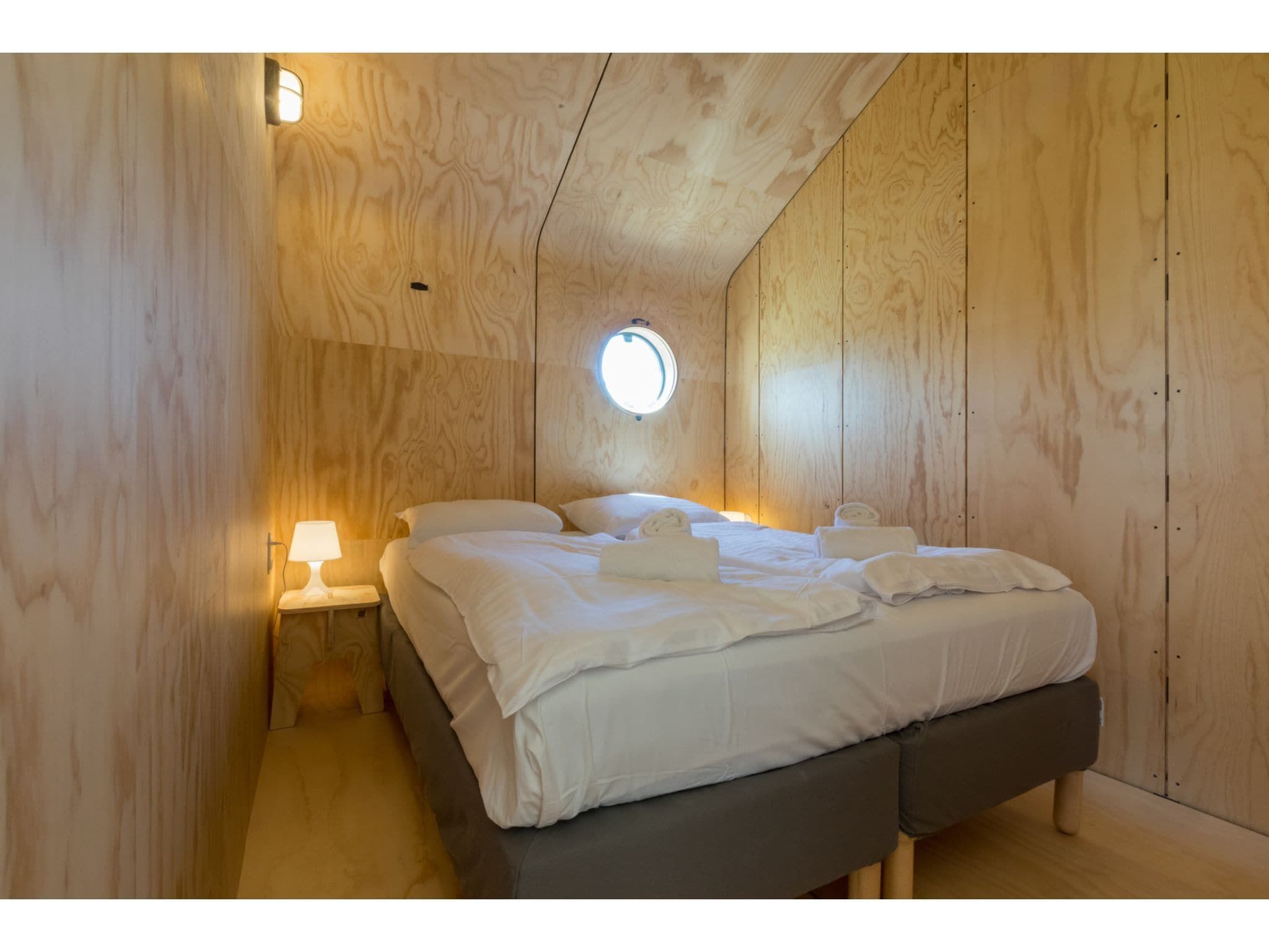 Een slaapkamer van Wikkelhouse - Kon Emmaweg 6  Vrouwenpolder in Vrouwenpolder