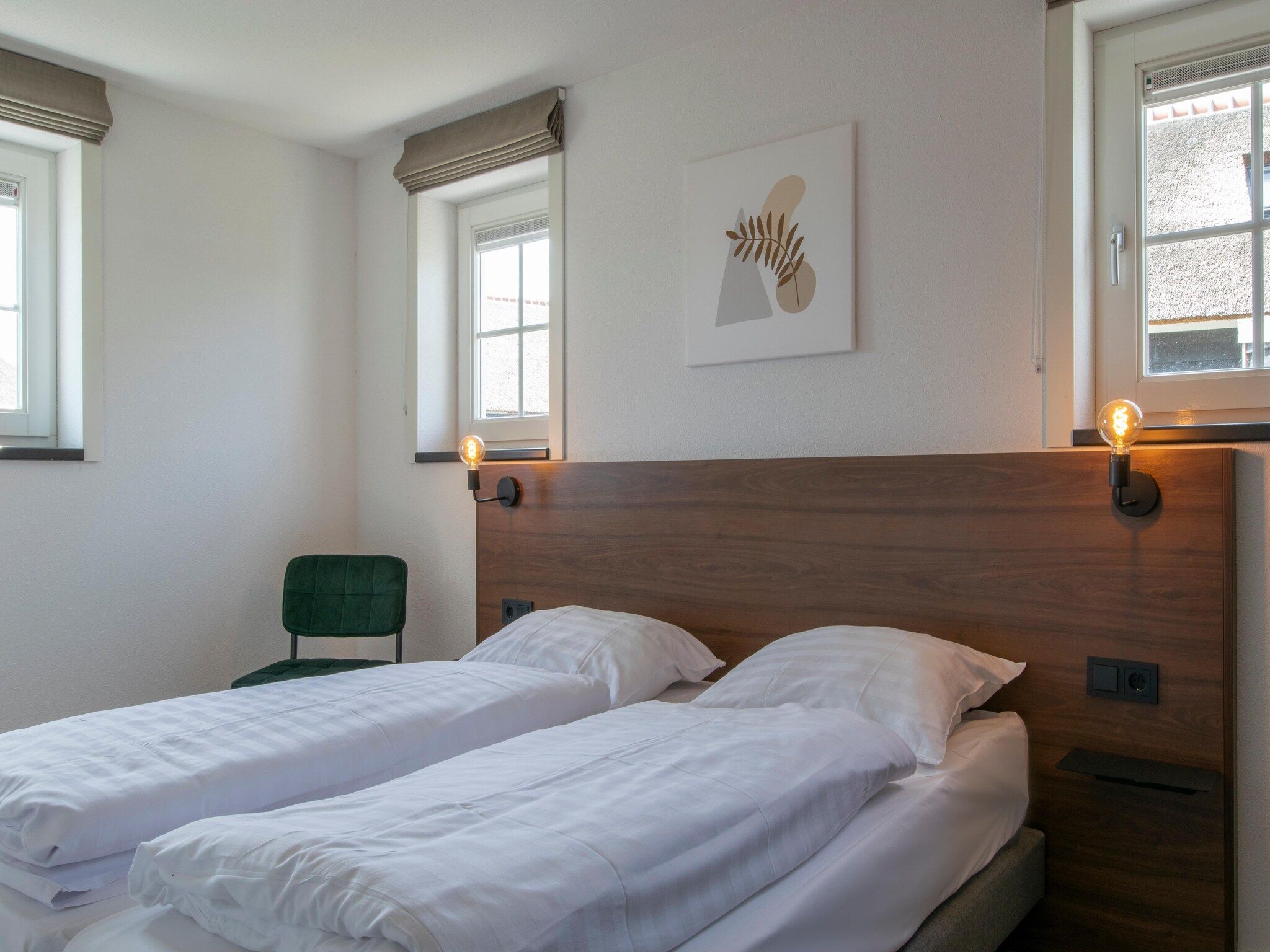 Een slaapkamer van Vakantiepark De Heihorsten 4 in Someren