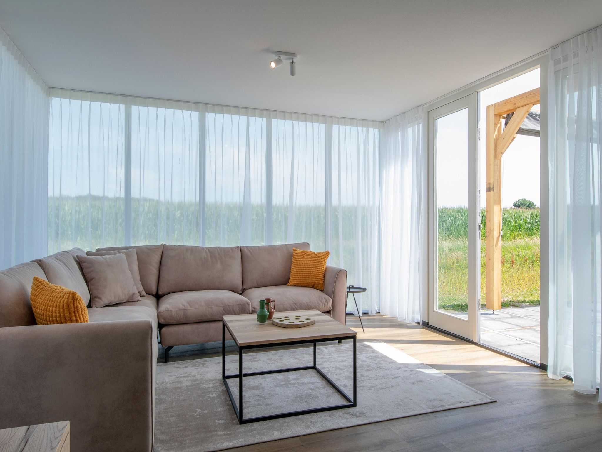 De woonkamer van Vakantiepark De Heihorsten 5 in Someren
