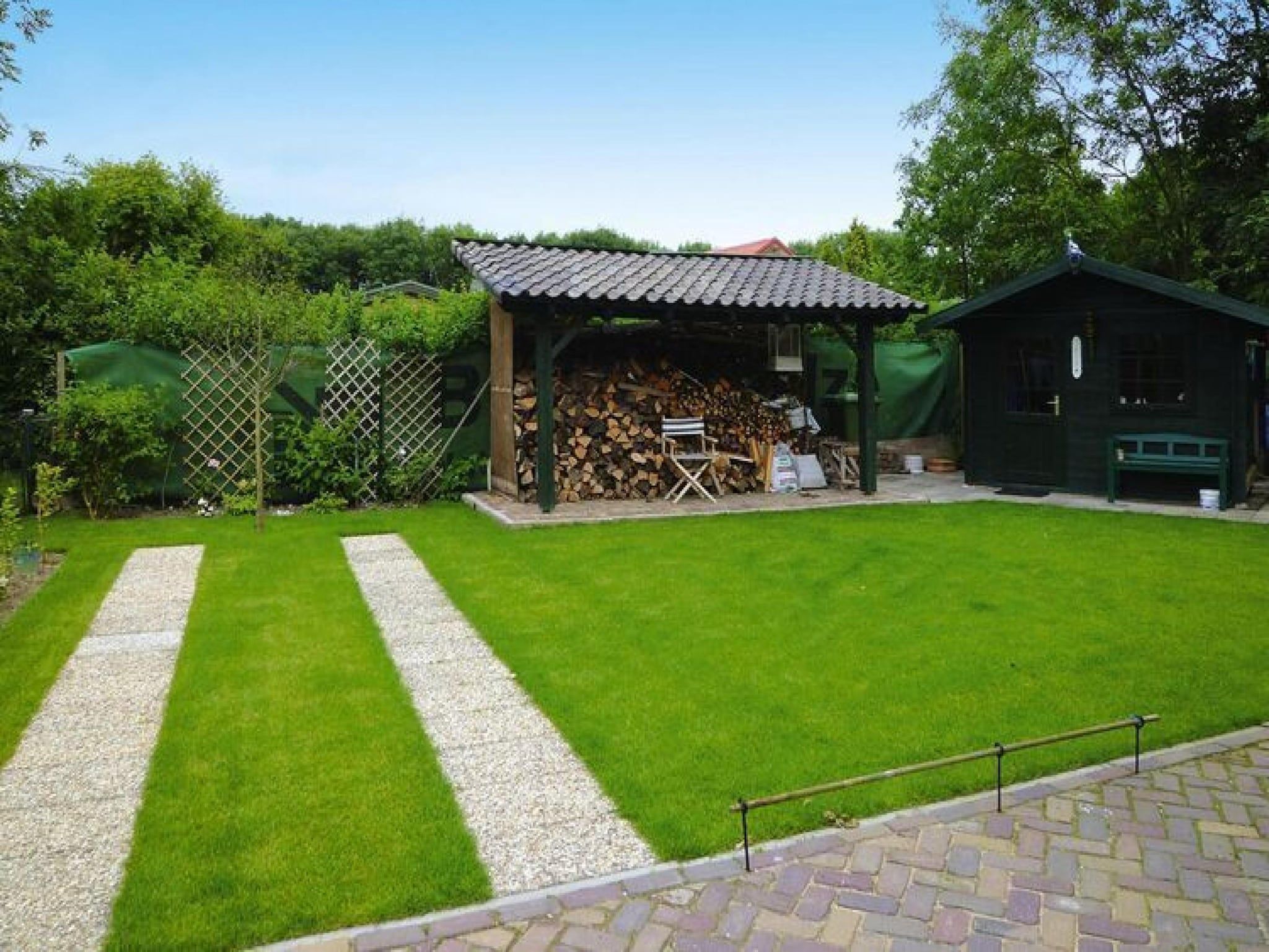 De tuin van Strandwoning Baarland in Zeeland in Baarland
