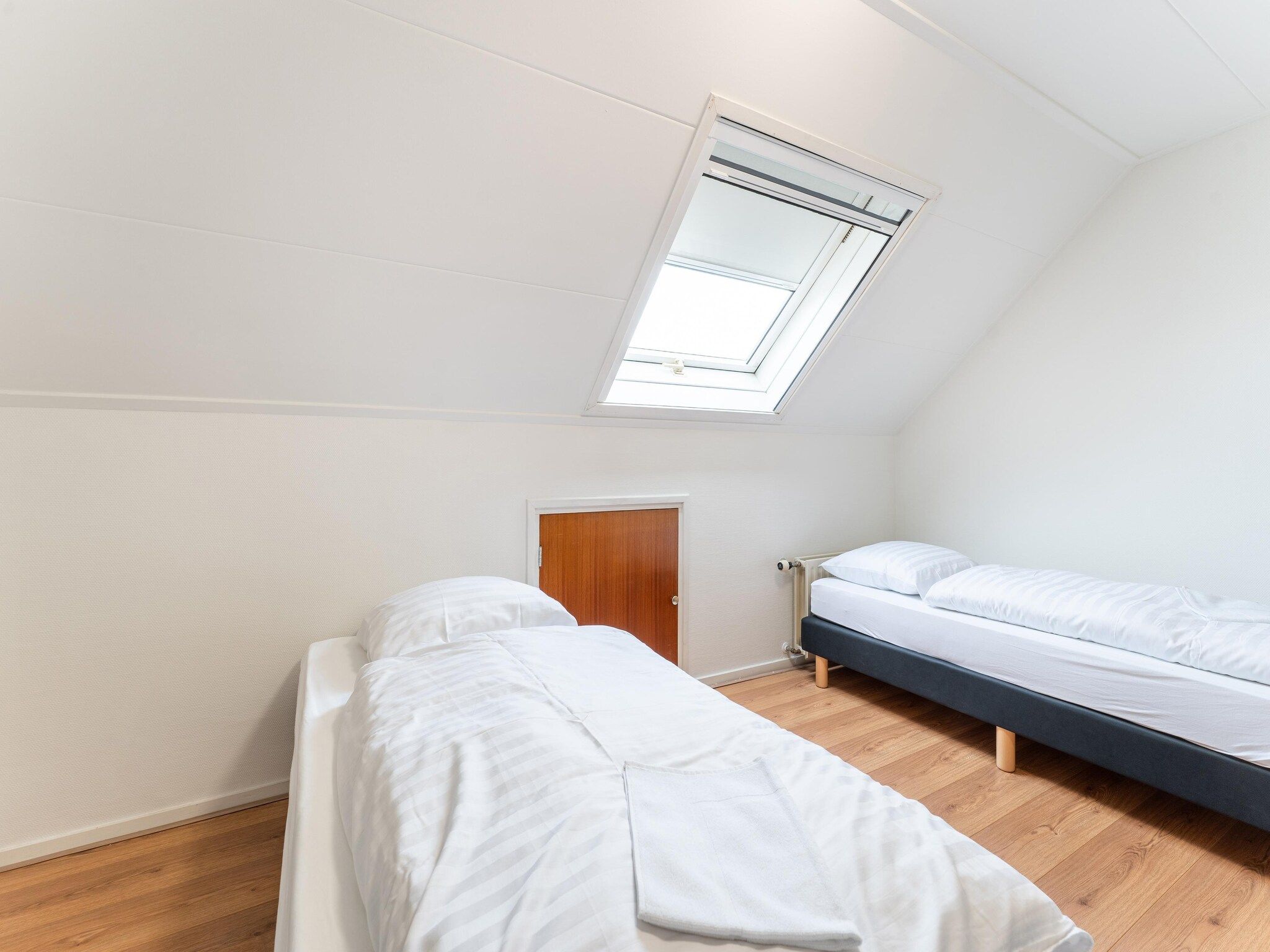 Een slaapkamer van Genieten in Silvolde II in Silvolde