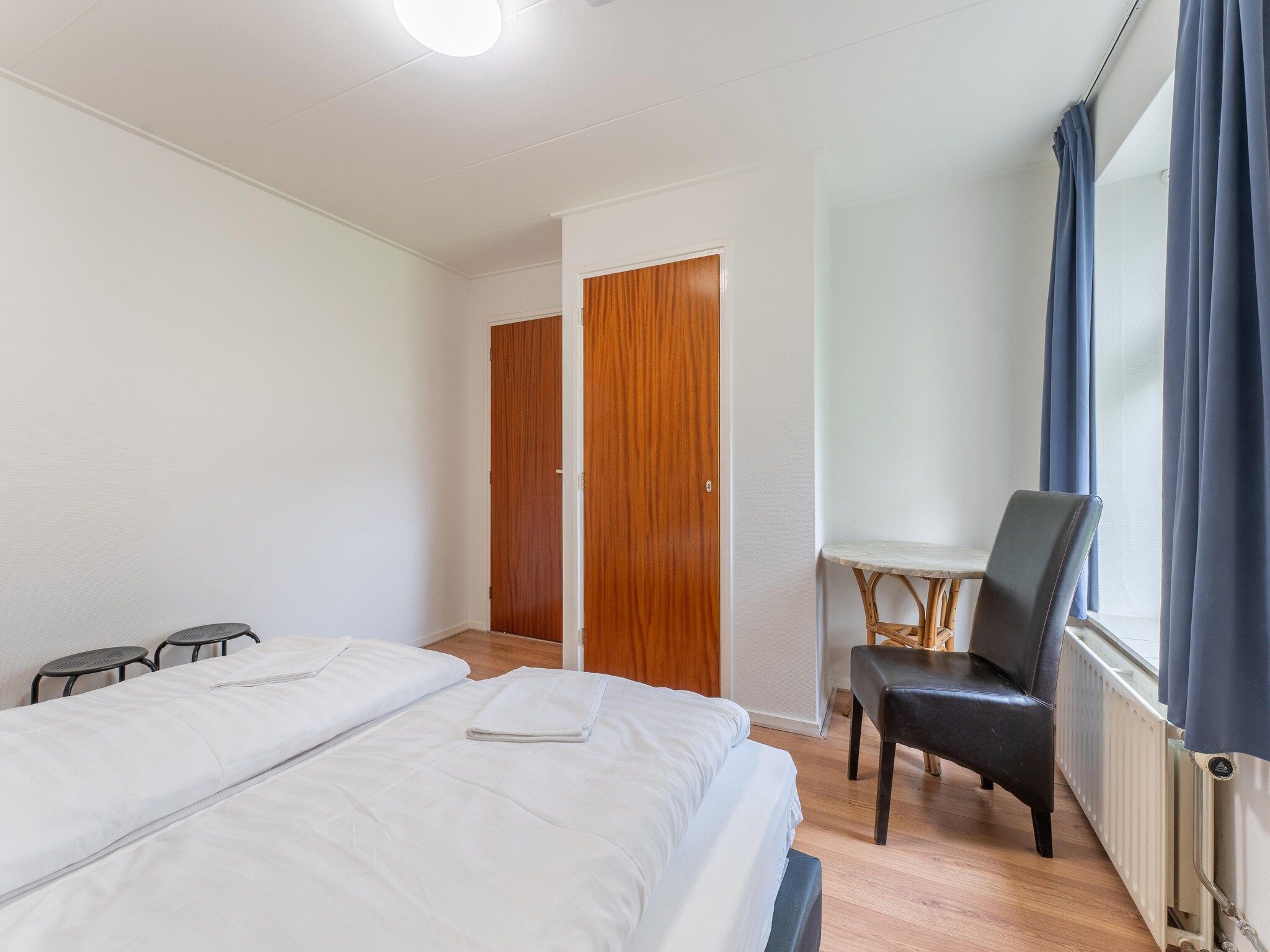 Een slaapkamer van Genieten in Silvolde II in Silvolde