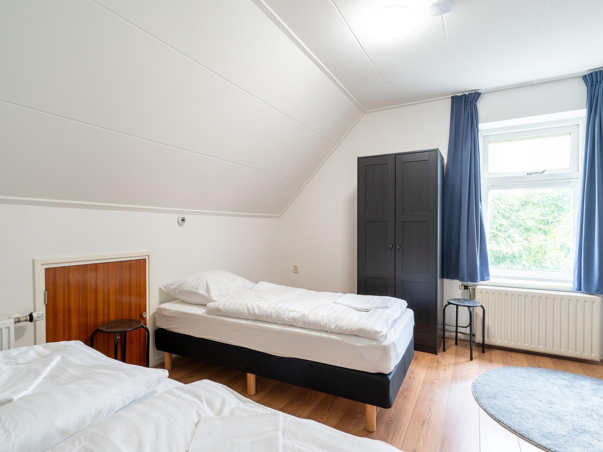 Een slaapkamer van Genieten in Silvolde II in Silvolde