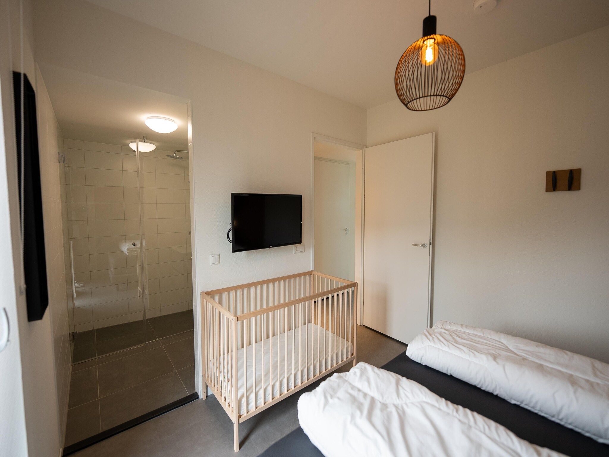 Een slaapkamer van Vakantiepark Zeebad 16 in Breskens