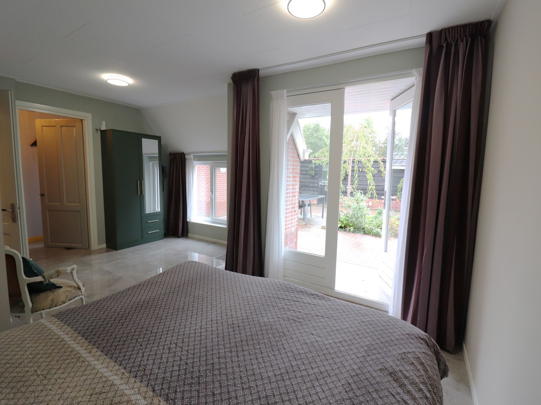 Een slaapkamer van Appartement Notenbomer in Kornhorn