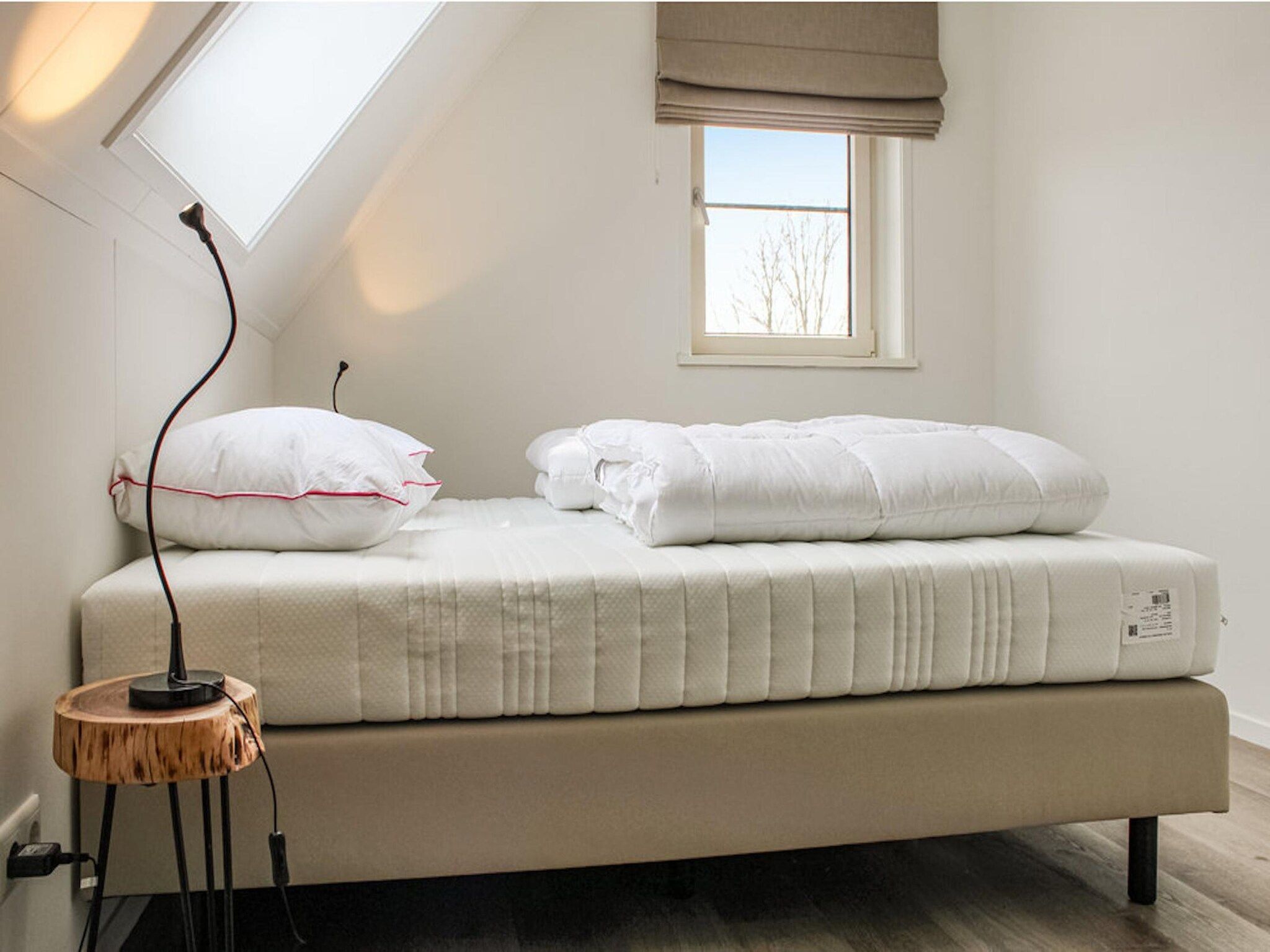 Een slaapkamer van Recreatiepark Idskenhuizen 2 in Idskenhuizen