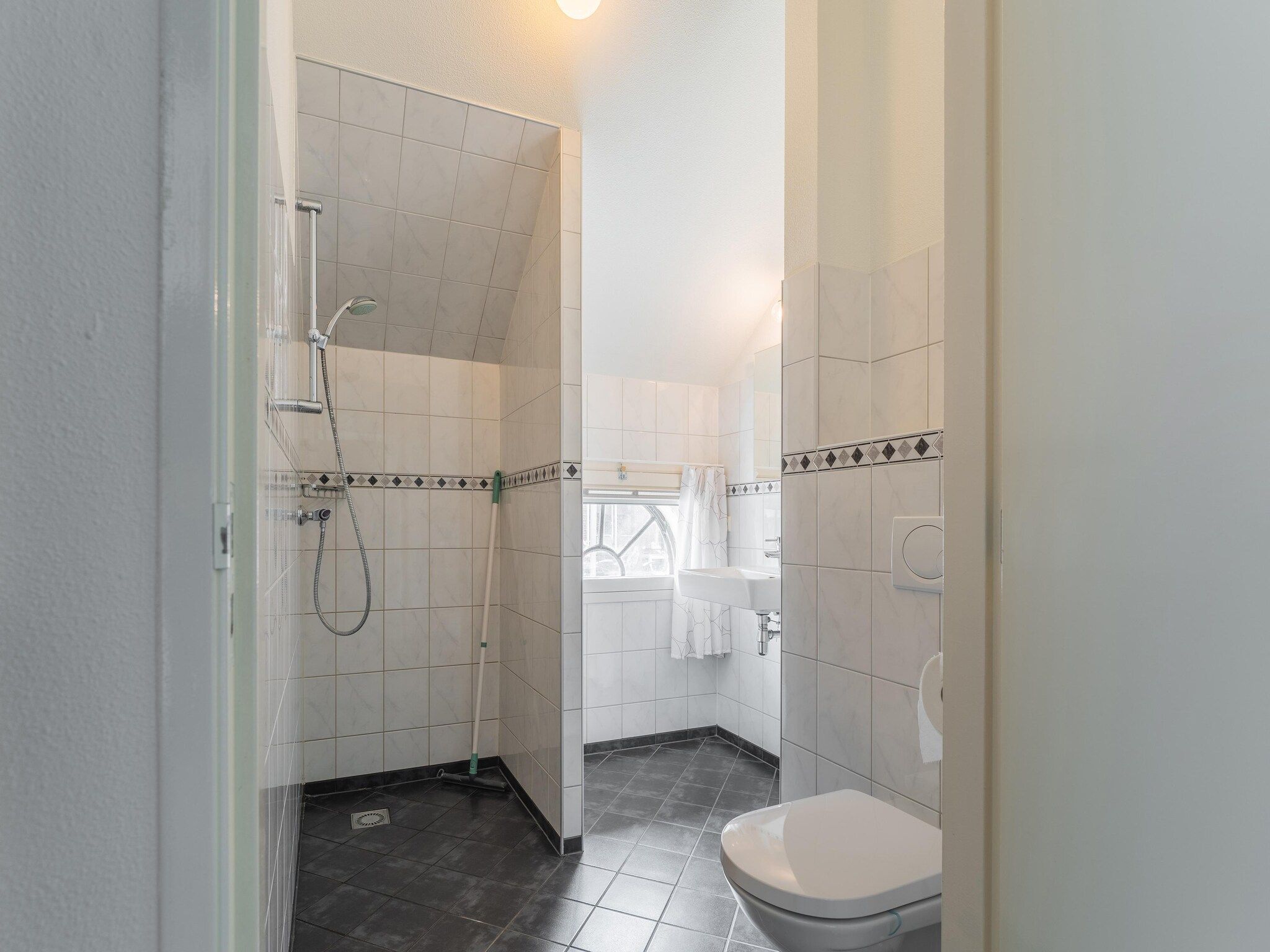 De badkamer van The Old Farmhouse in Montfoort