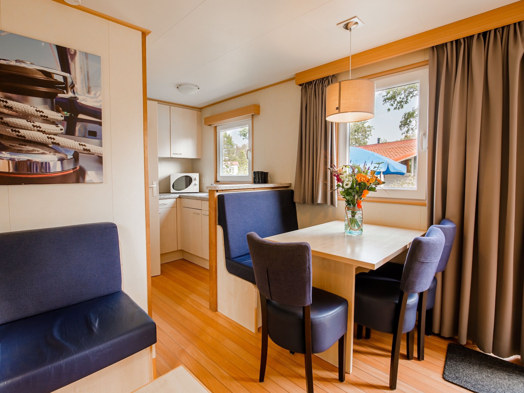 De woonkamer van Vakantiepark Leukermeer 3 in Well
