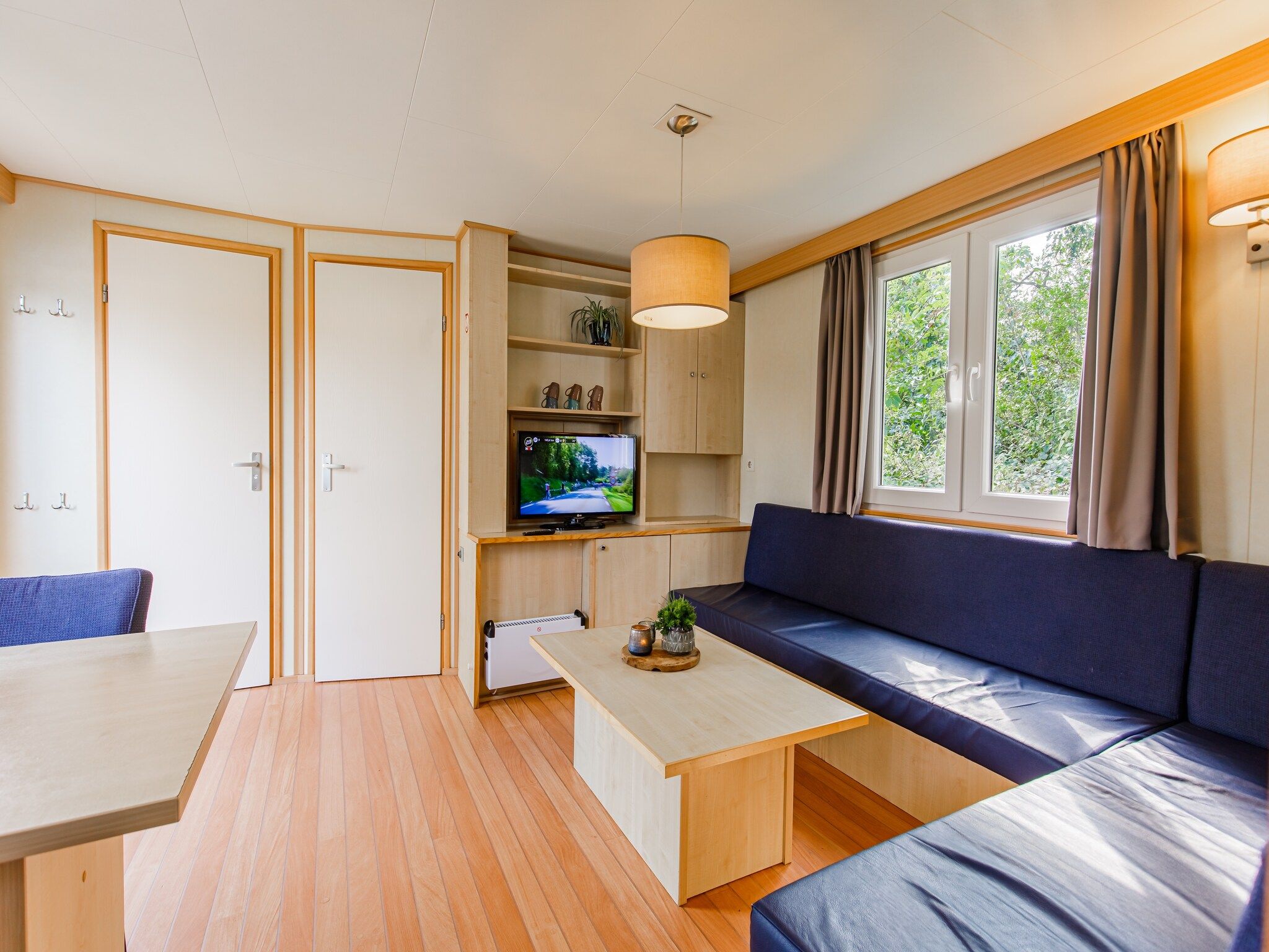 De woonkamer van Vakantiepark Leukermeer 3 in Well