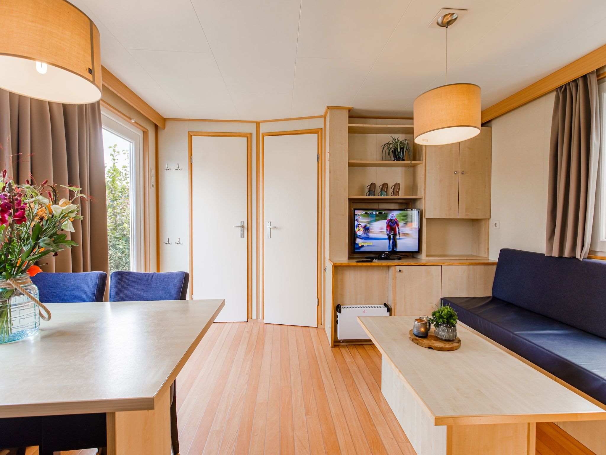 De woonkamer van Vakantiepark Leukermeer 3 in Well