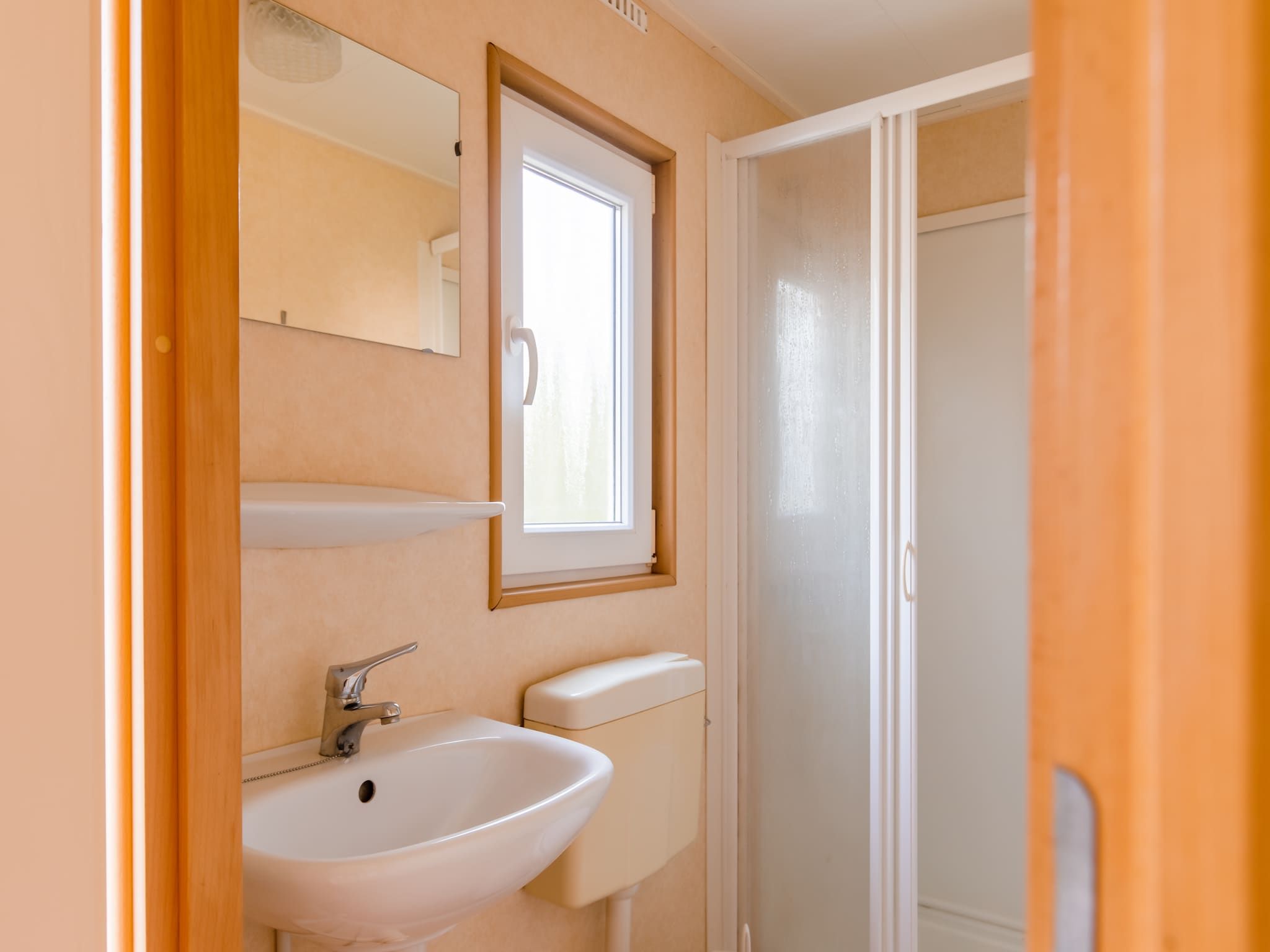 De badkamer van Vakantiepark Leukermeer 5 in Well