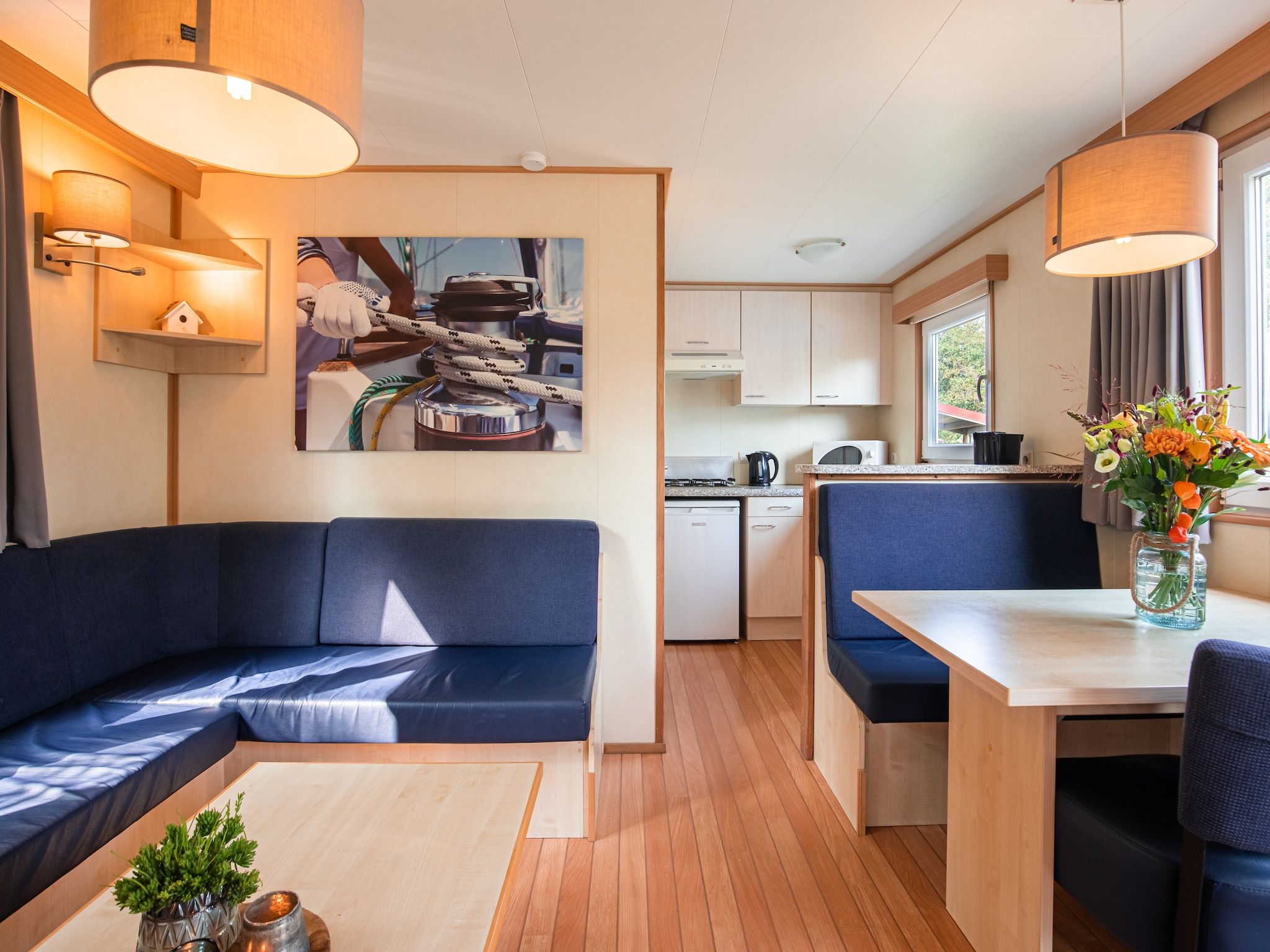 De woonkamer van Vakantiepark Leukermeer 5 in Well