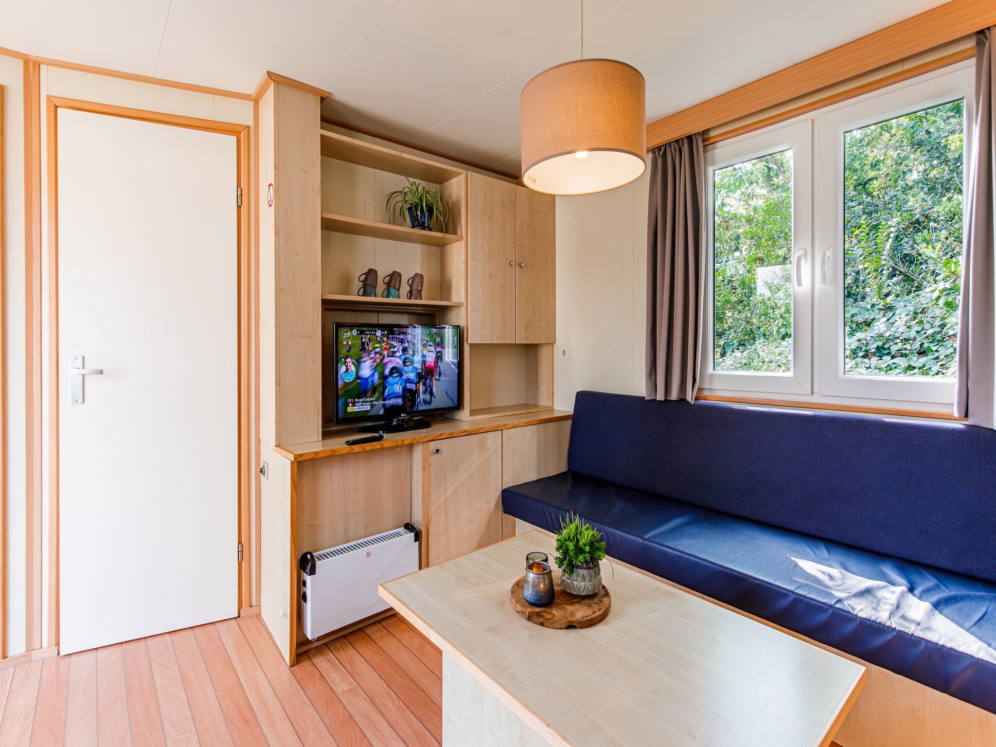 De woonkamer van Vakantiepark Leukermeer 5 in Well