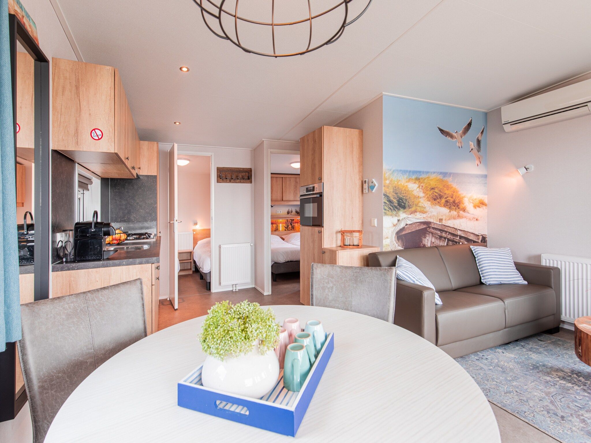 De woonkamer van Vakantiepark Leukermeer 9 in Well