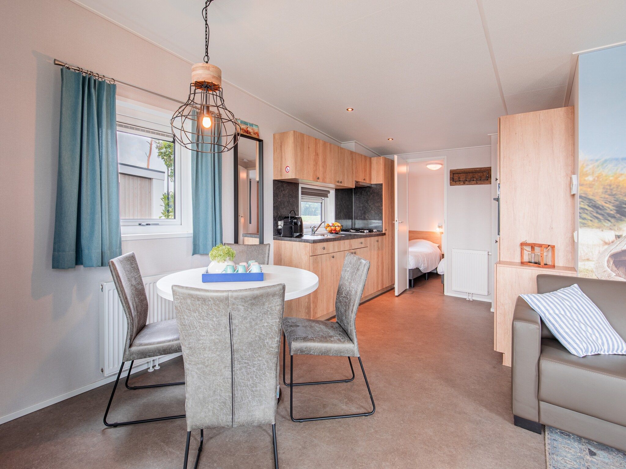 De woonkamer van Vakantiepark Leukermeer 9 in Well