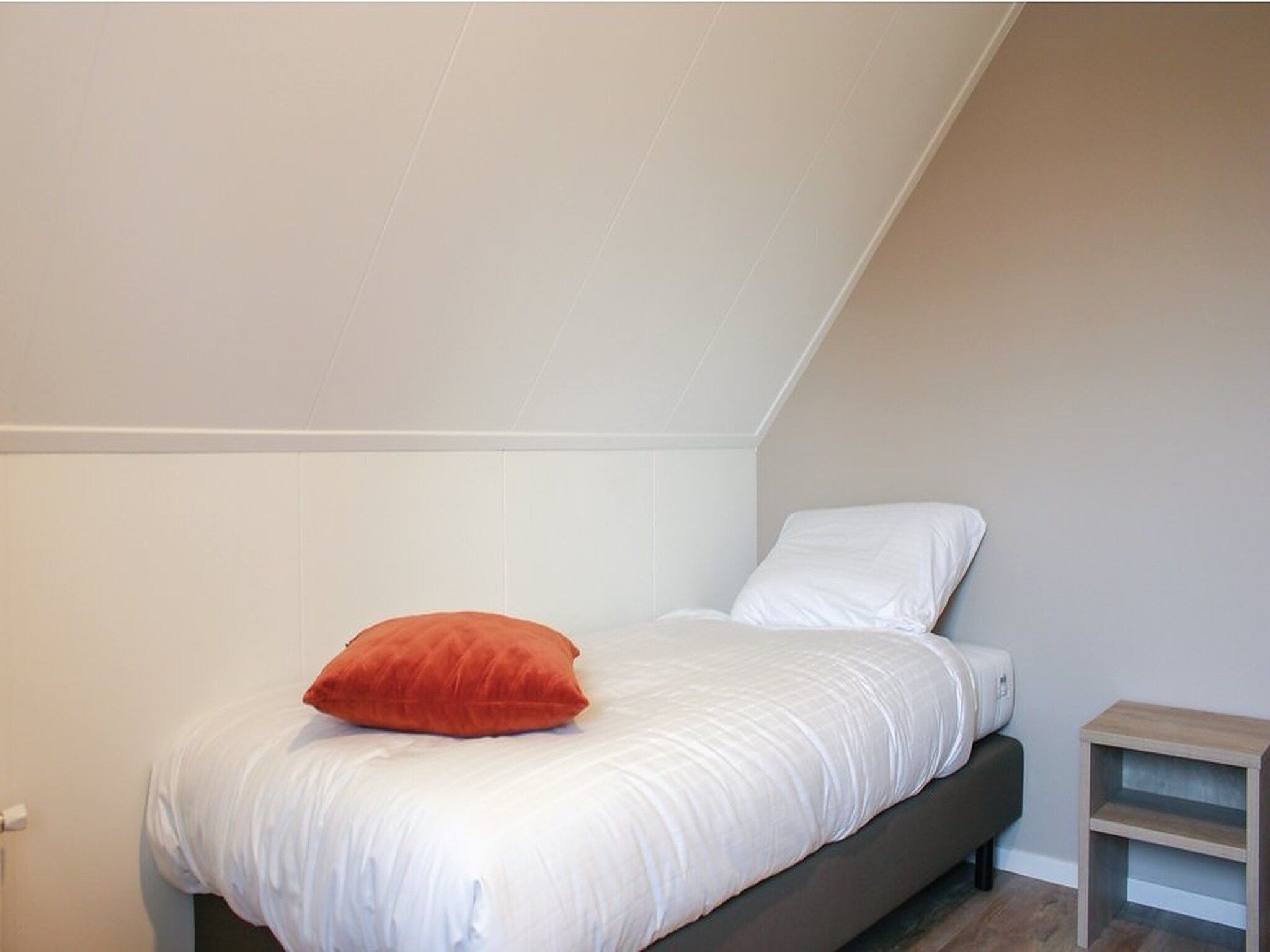 Een slaapkamer van Recreatiepark Idskenhuizen 7 in Idskenhuizen